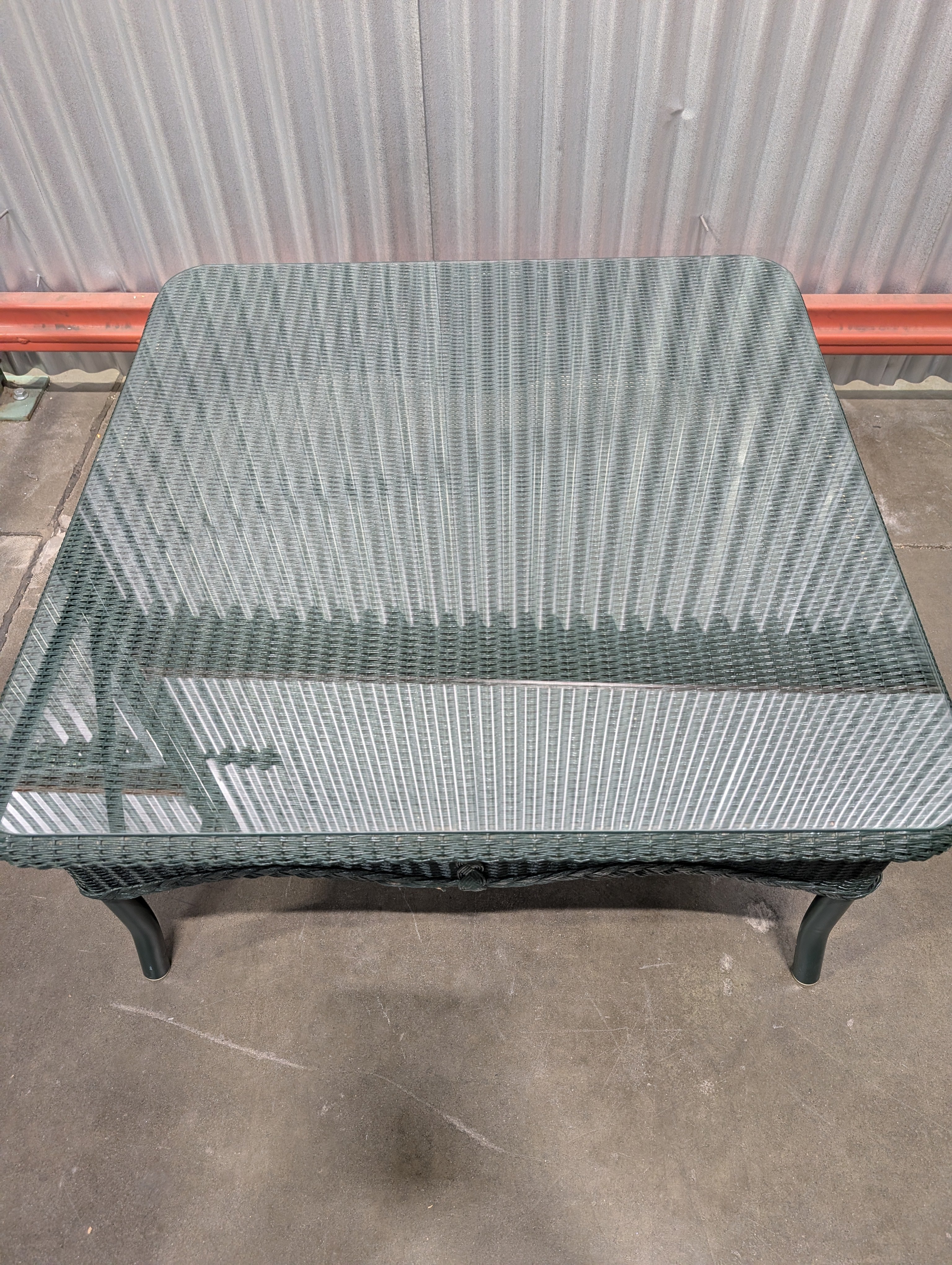 Large Green Resin Wicker Woven Outdoor Table with Glass Top - Image 3