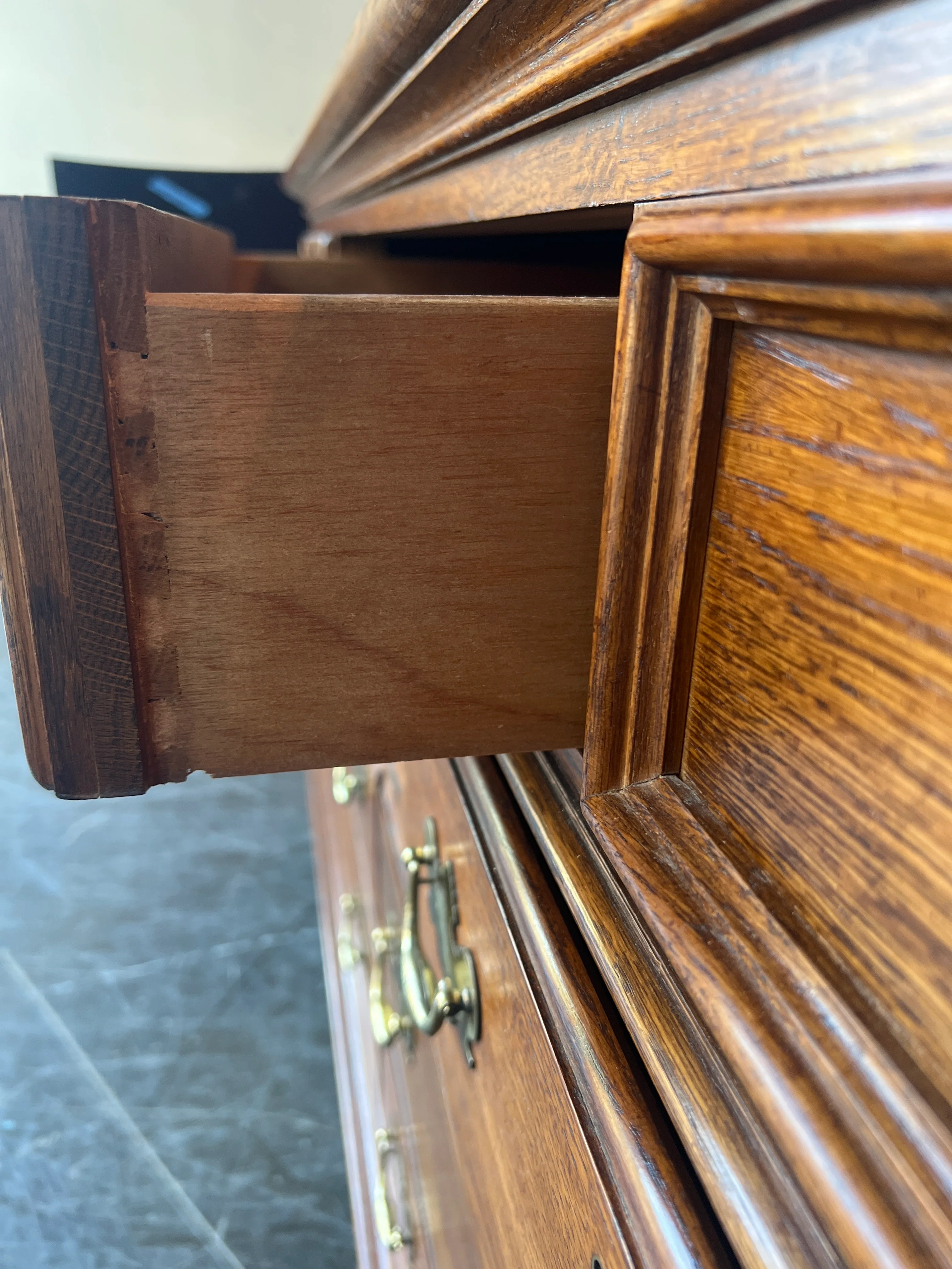 Richly-Toned Wood Dresser with Carved Center Drawer - Image 4