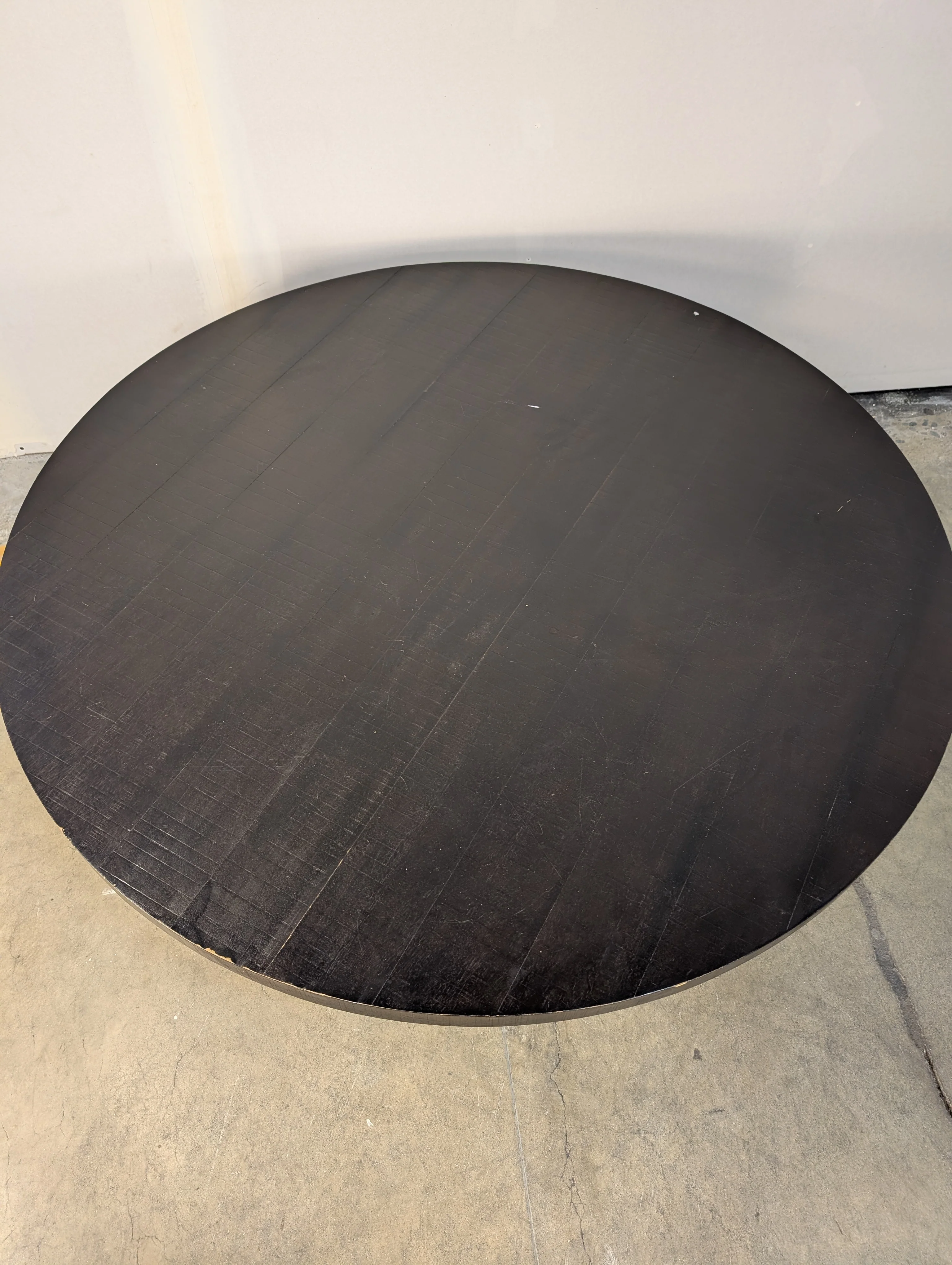 Modern Round Charcoal Coffee Table with Textured Surface - Image 3