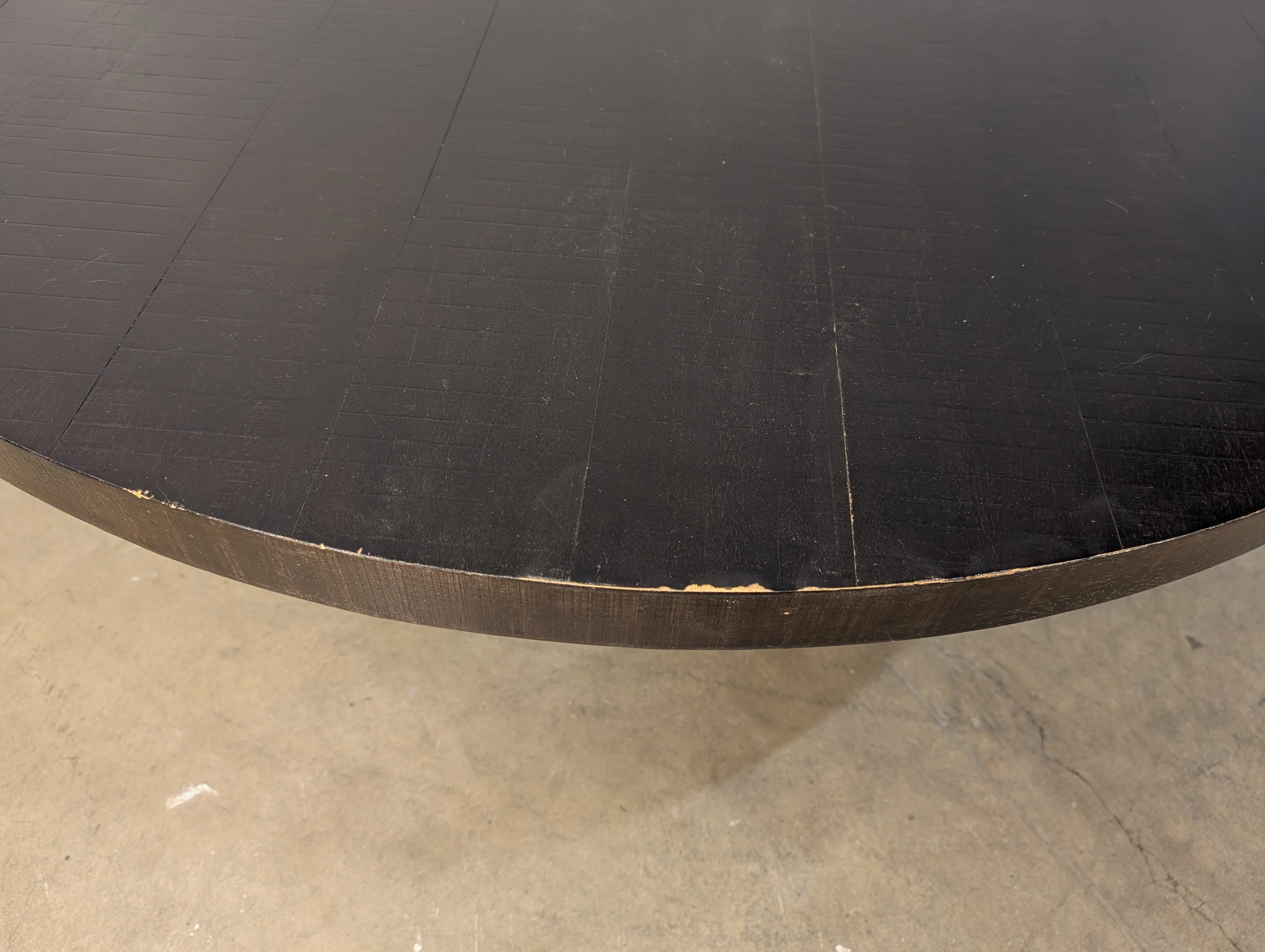 Modern Round Charcoal Coffee Table with Textured Surface - Image 4
