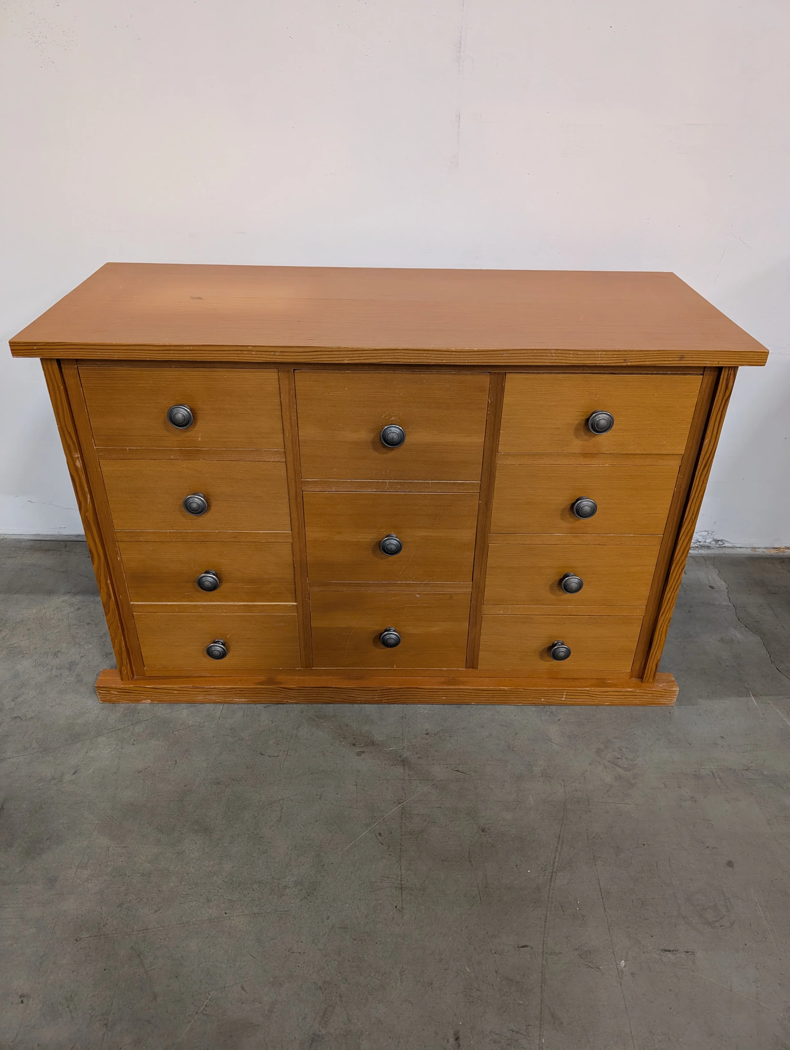Warm Honey Wood Nine-Drawer Storage Chest