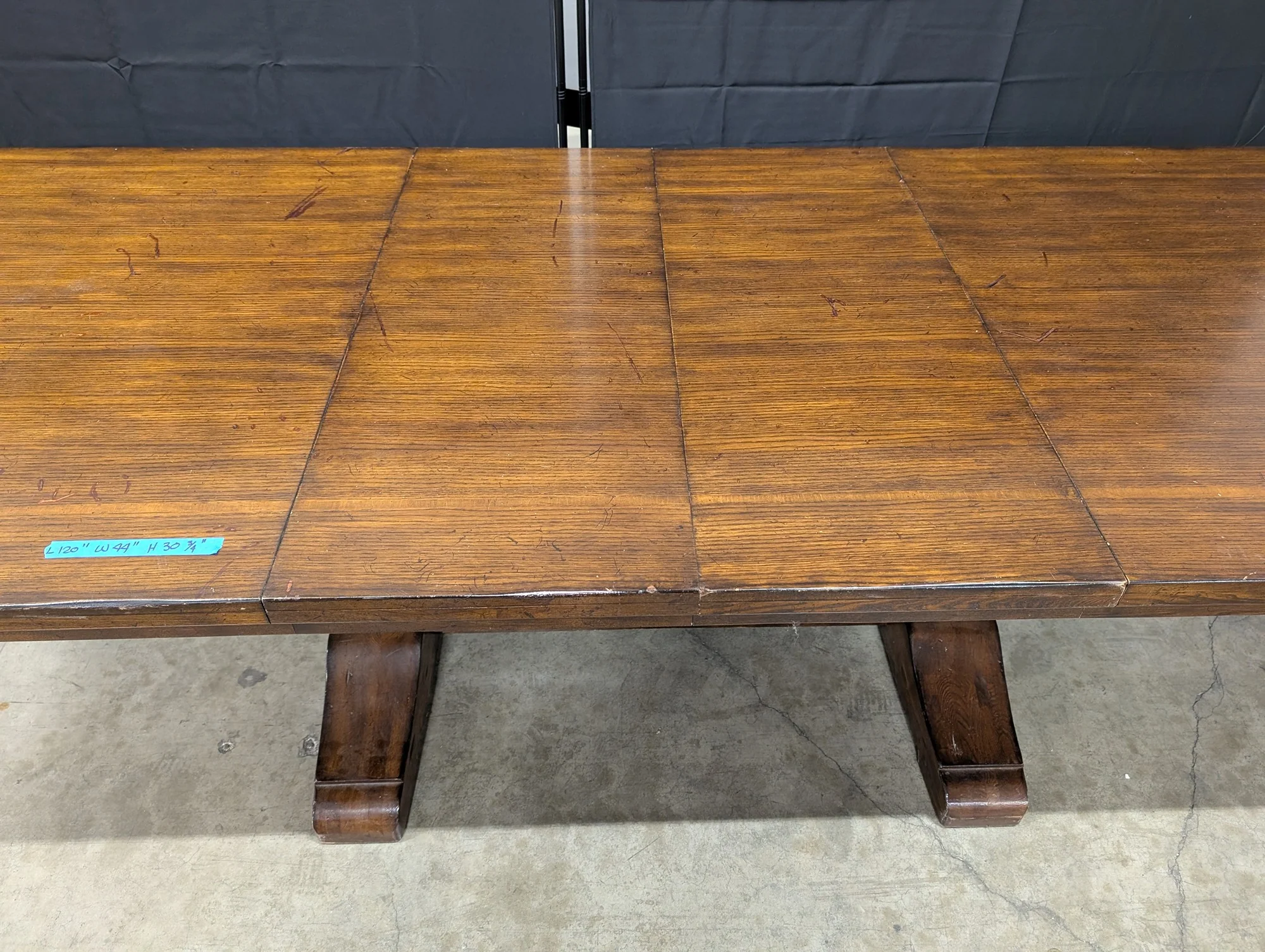 Expansive Dark Wood Pedestal Dining Table with Extension Capability - Image 2