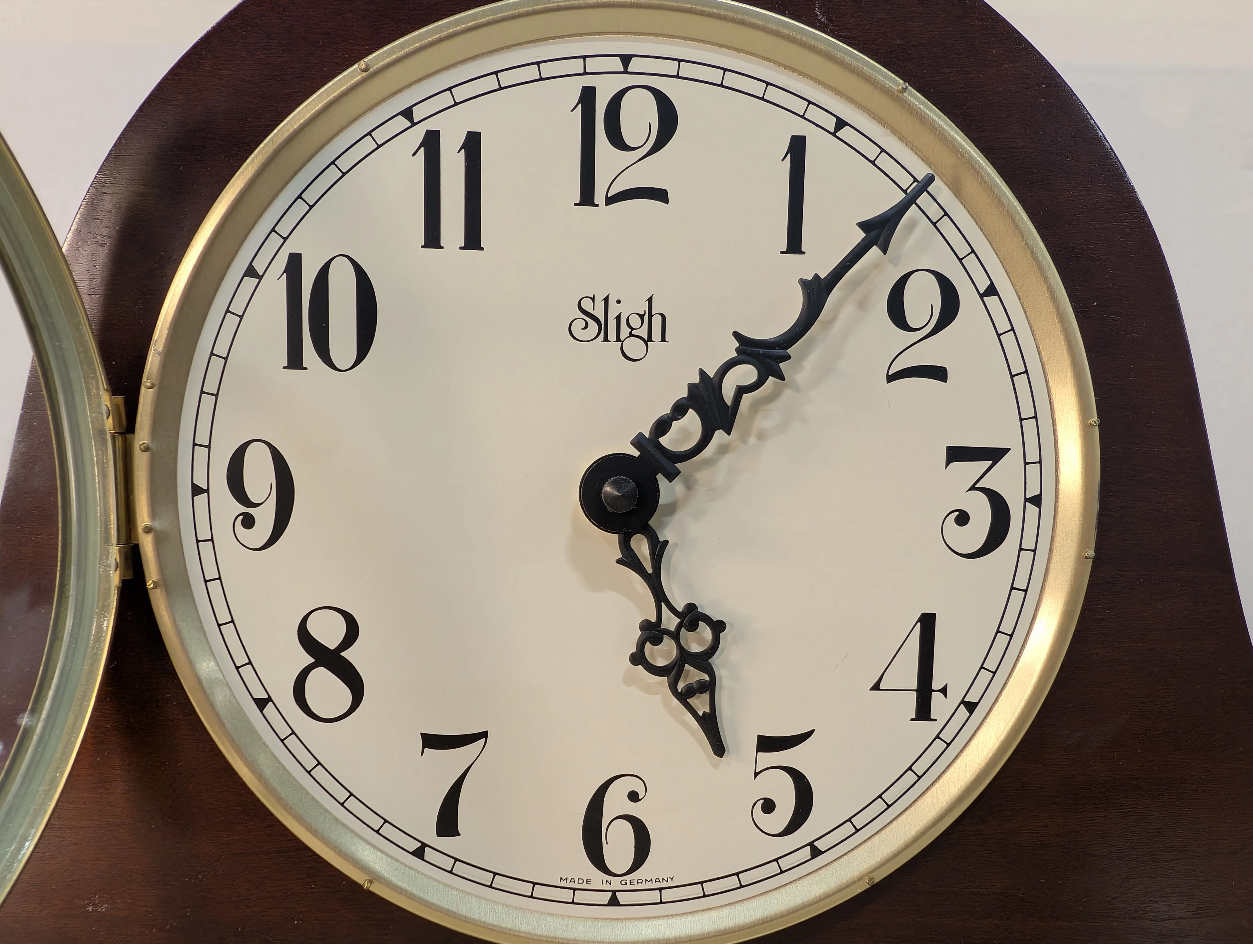 Curved Dark Wood Table Clock with Brass Tone Bezel - Image 4