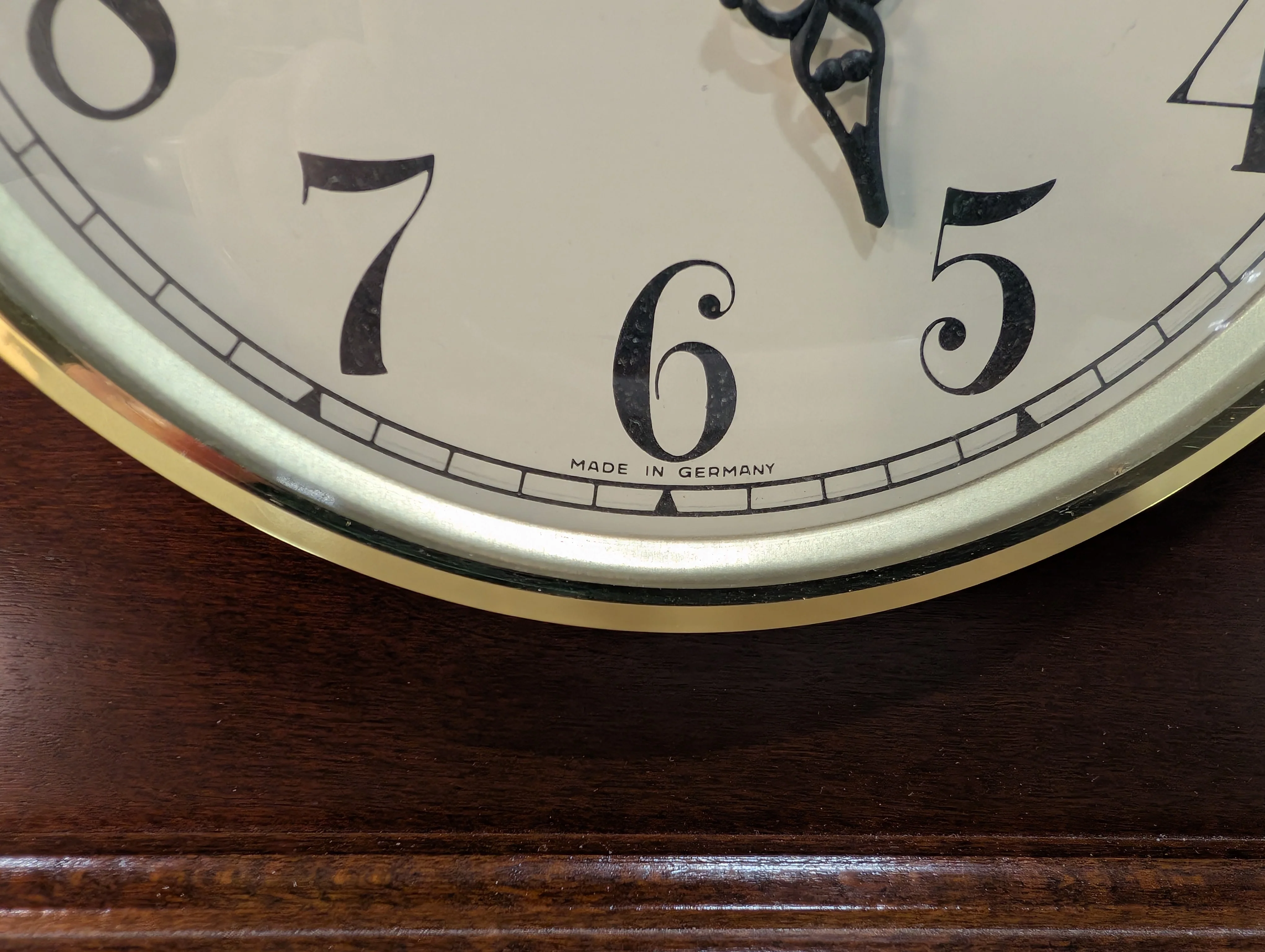 Curved Dark Wood Table Clock with Brass Tone Bezel - Image 5