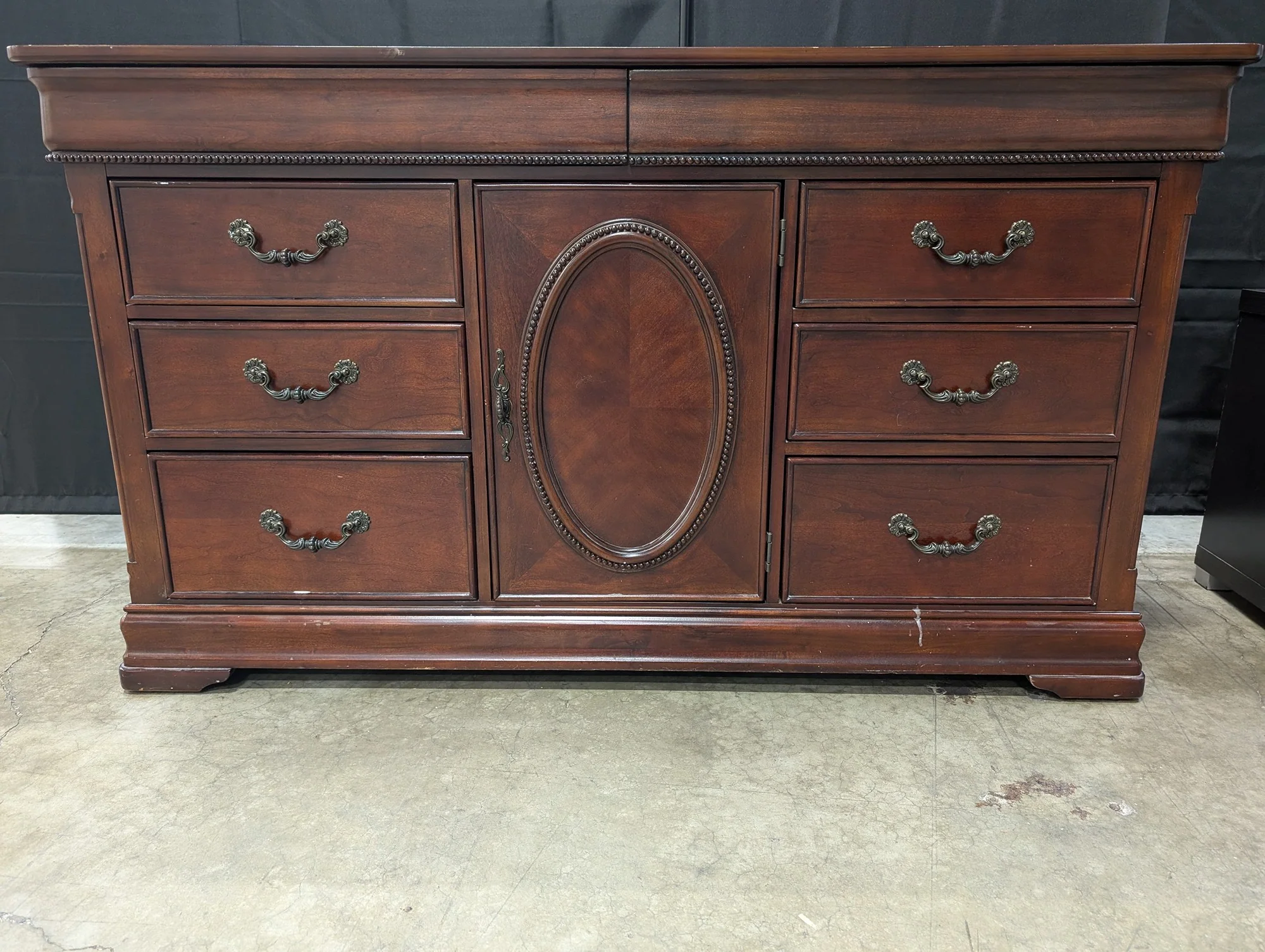 Traditional Dark Wood Dresser with Ornate Hardware - Image 3