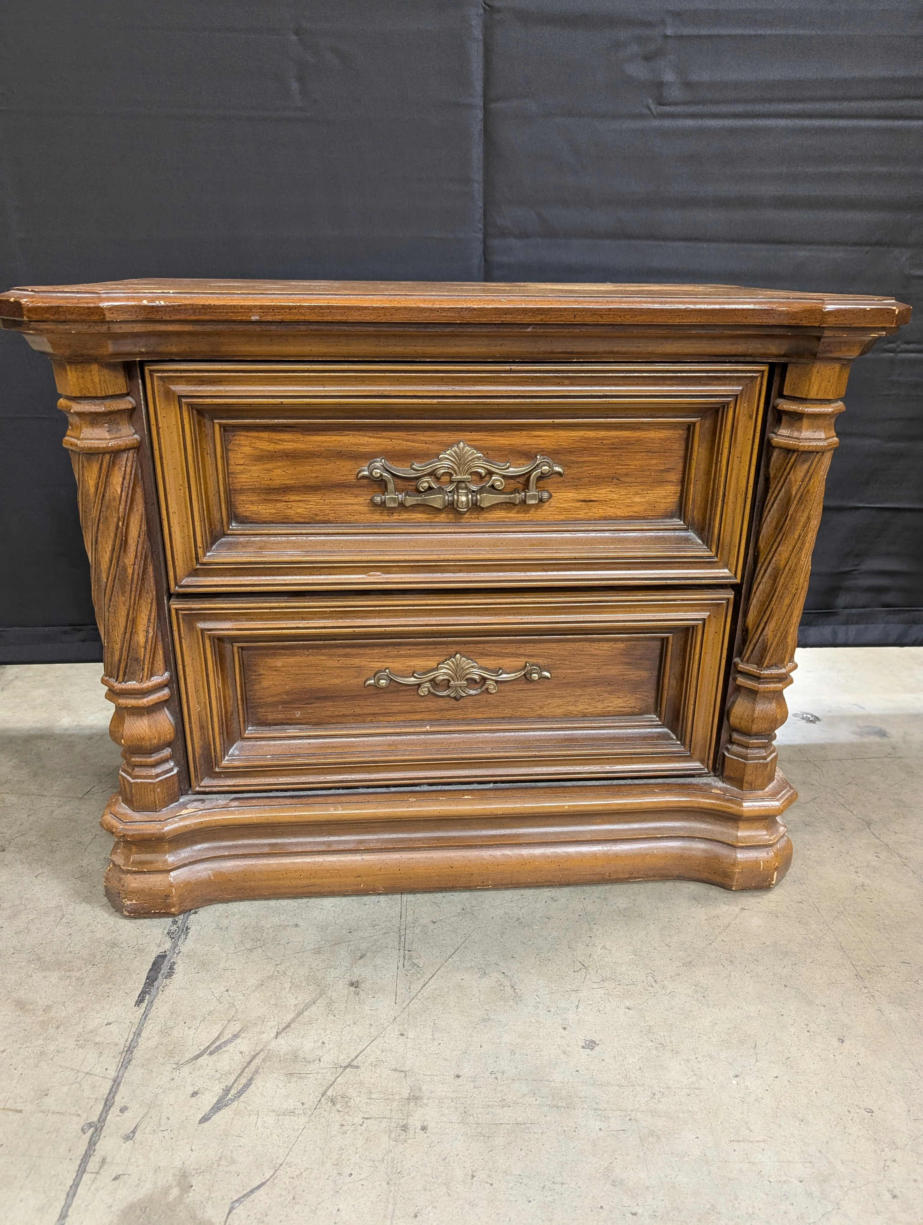 Vintage Wooden Nightstand with Two Drawers, Ornate Pulls & Carved Accents