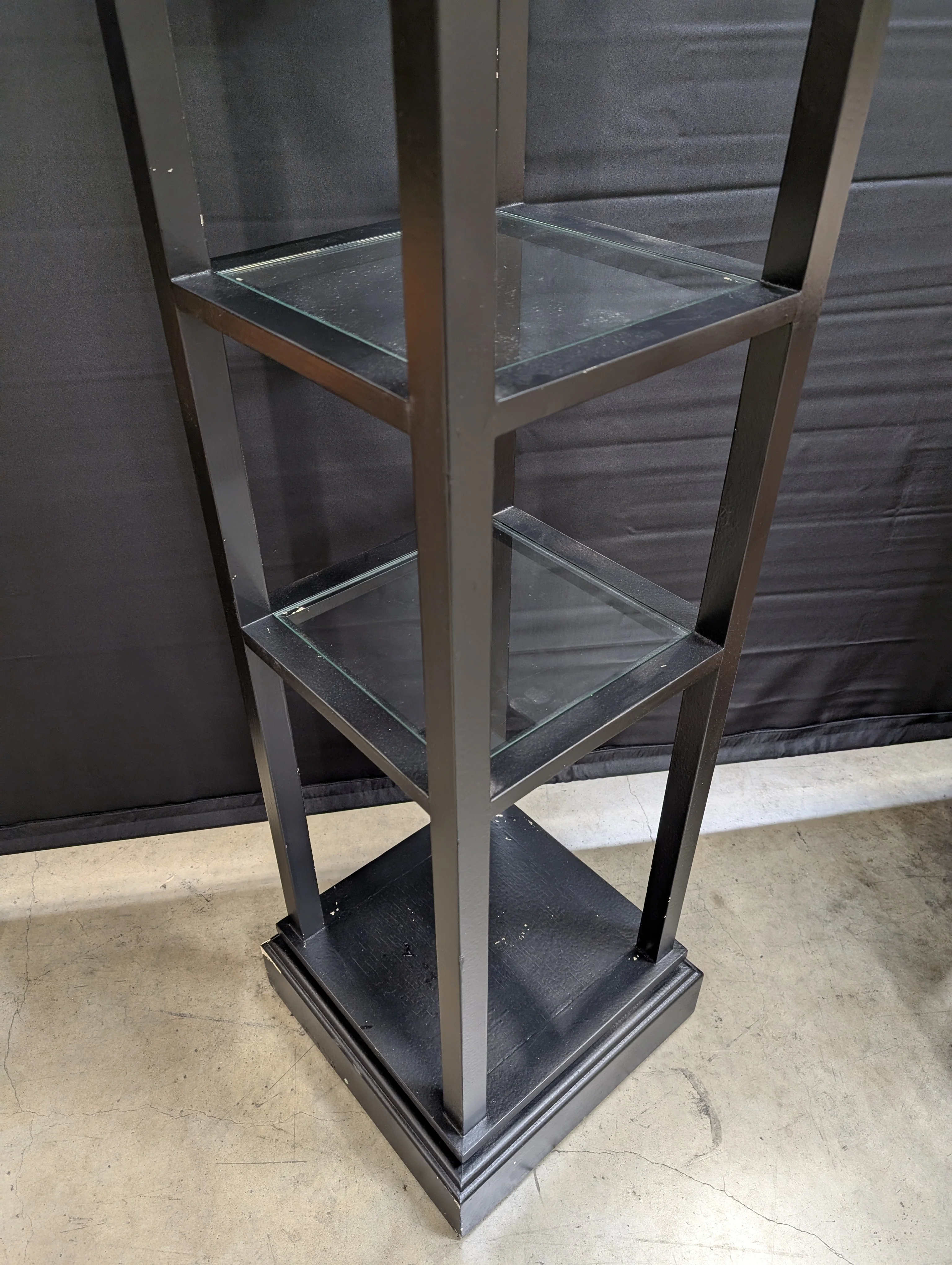 Slim Black Display Shelf Unit with Decorative Finial Top and Molded Base - Image 3
