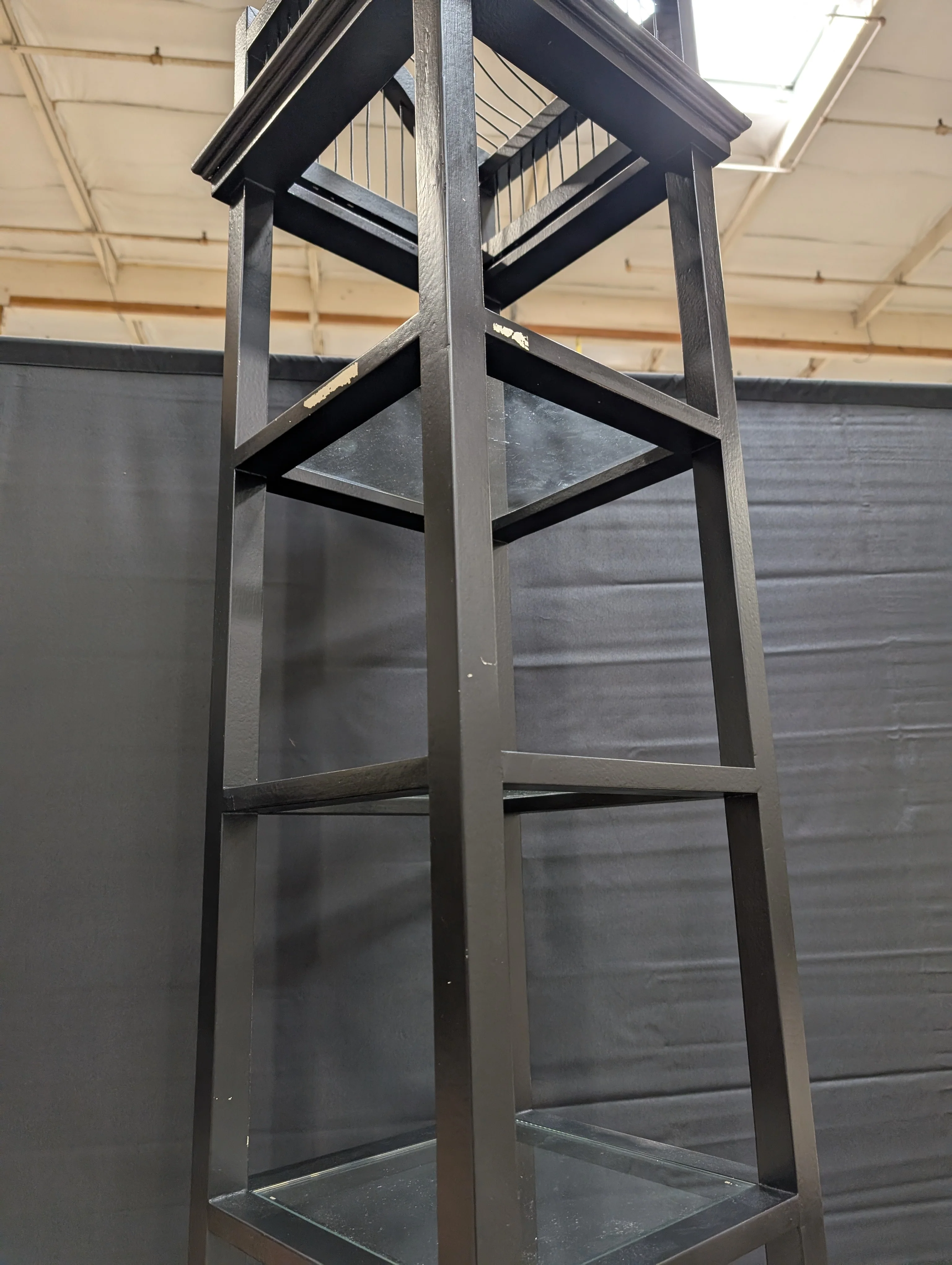 Slim Black Display Shelf Unit with Decorative Finial Top and Molded Base - Image 4