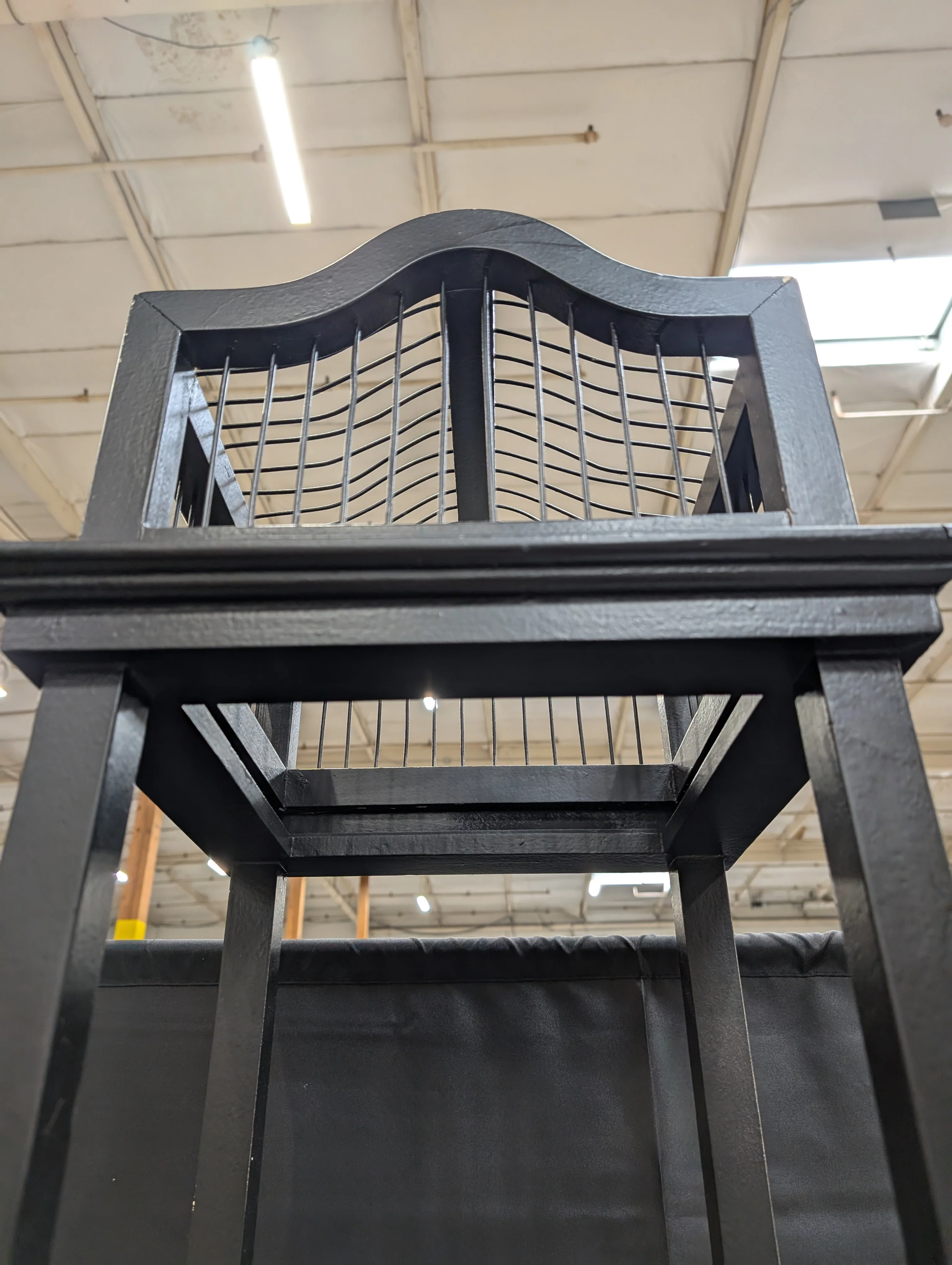 Slim Black Display Shelf Unit with Decorative Finial Top and Molded Base - Image 5