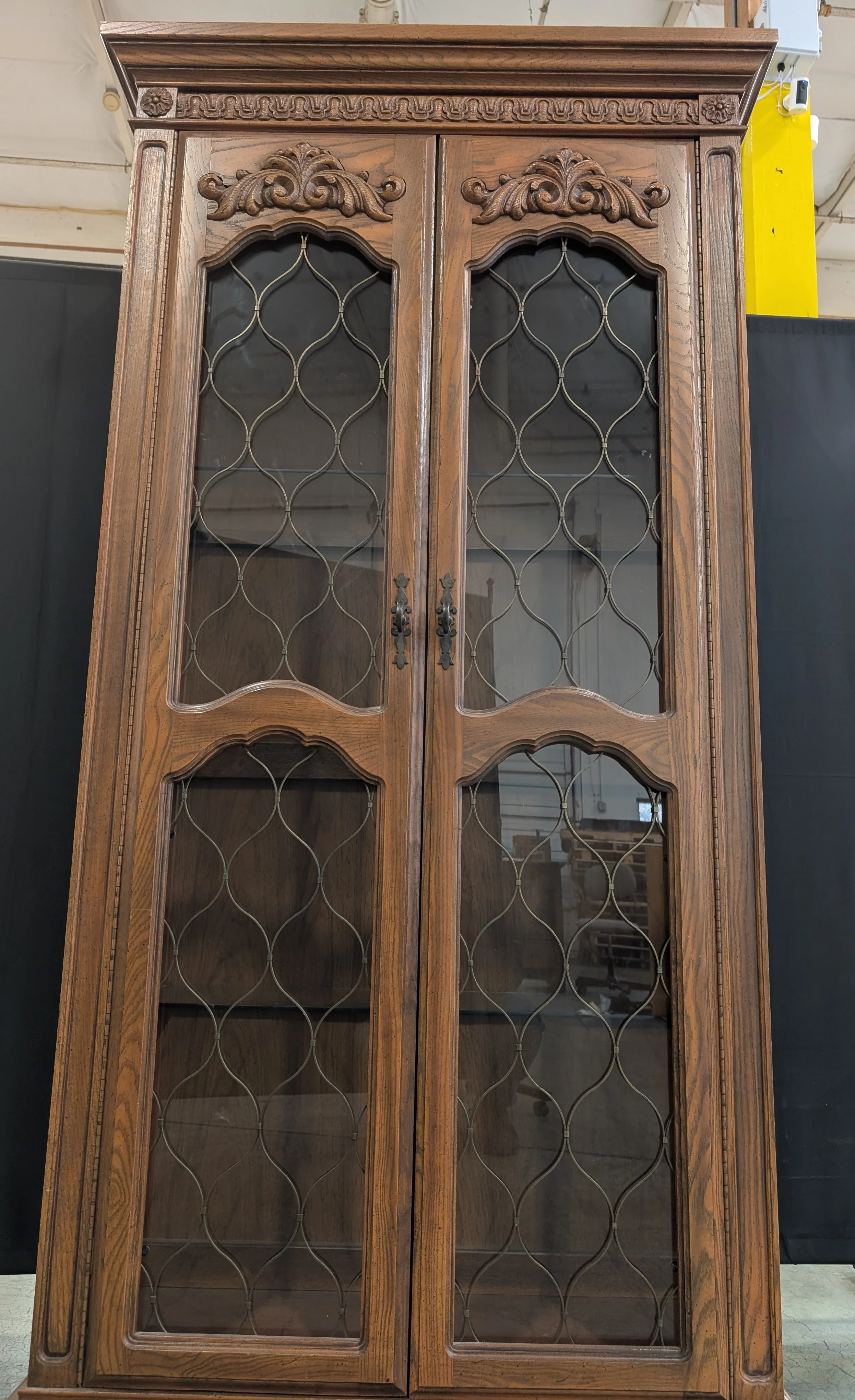 Ornate Wood Display Cabinet with Leaded Glass Doors