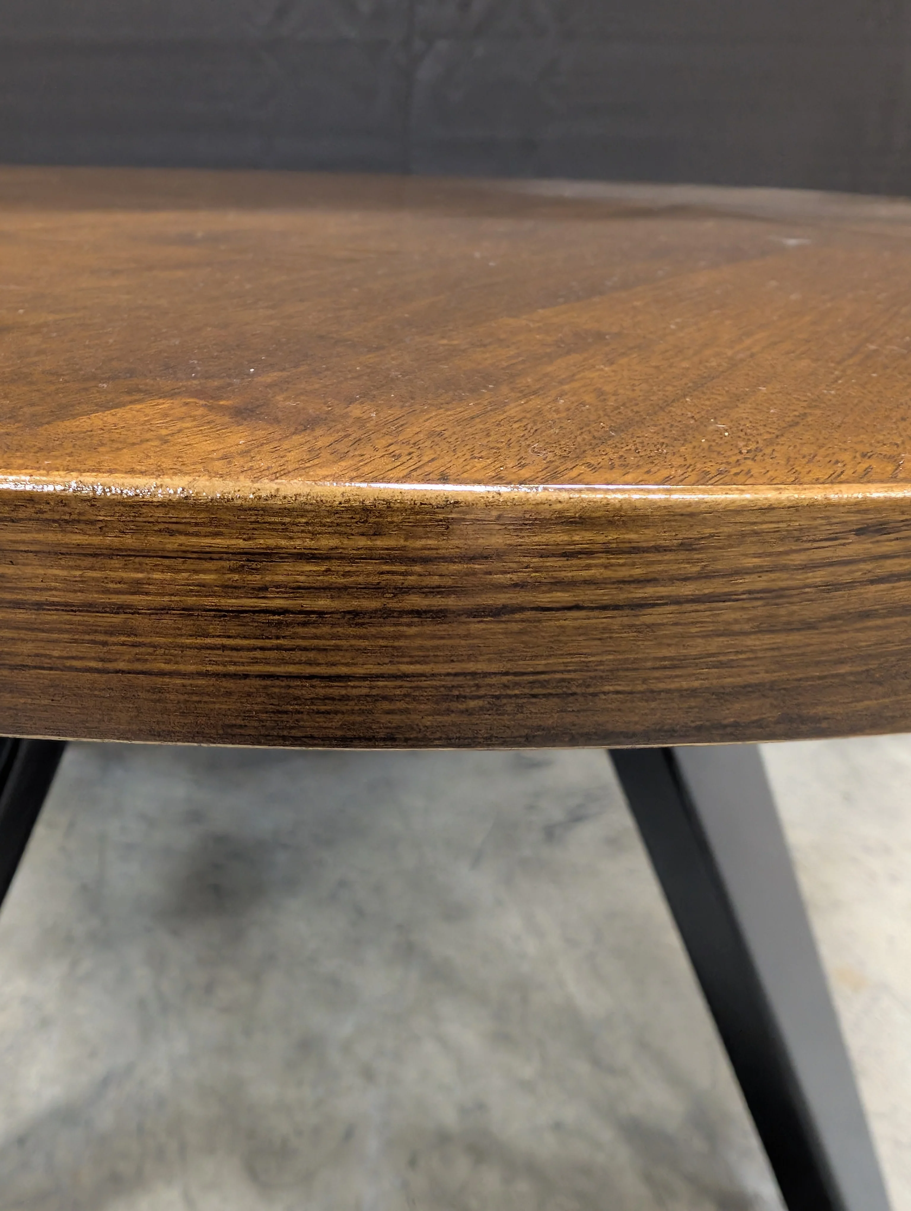 Round Dark Wood Coffee Table with Tapered Legs - Image 4