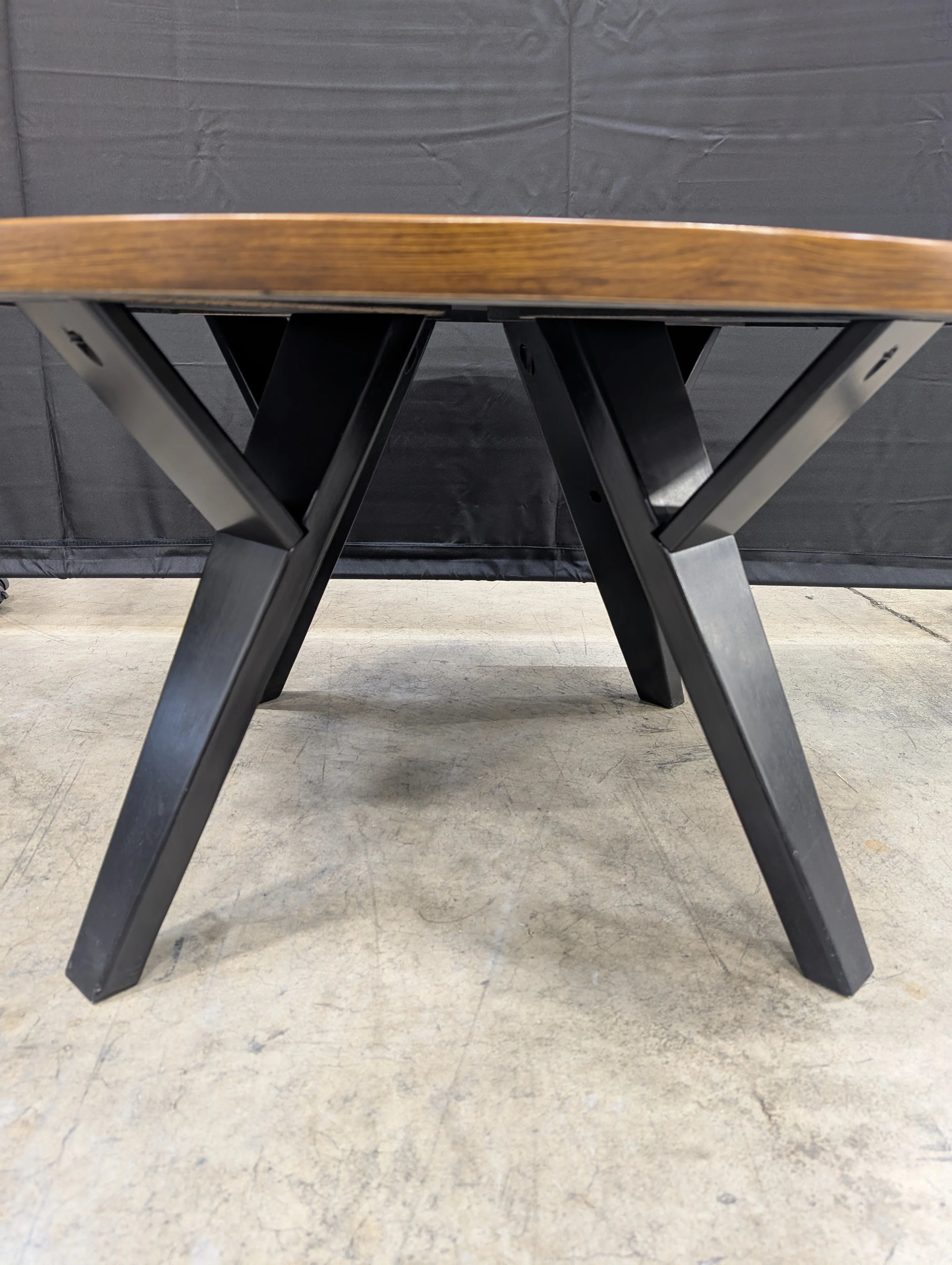 Round Dark Wood Coffee Table with Tapered Legs - Image 5