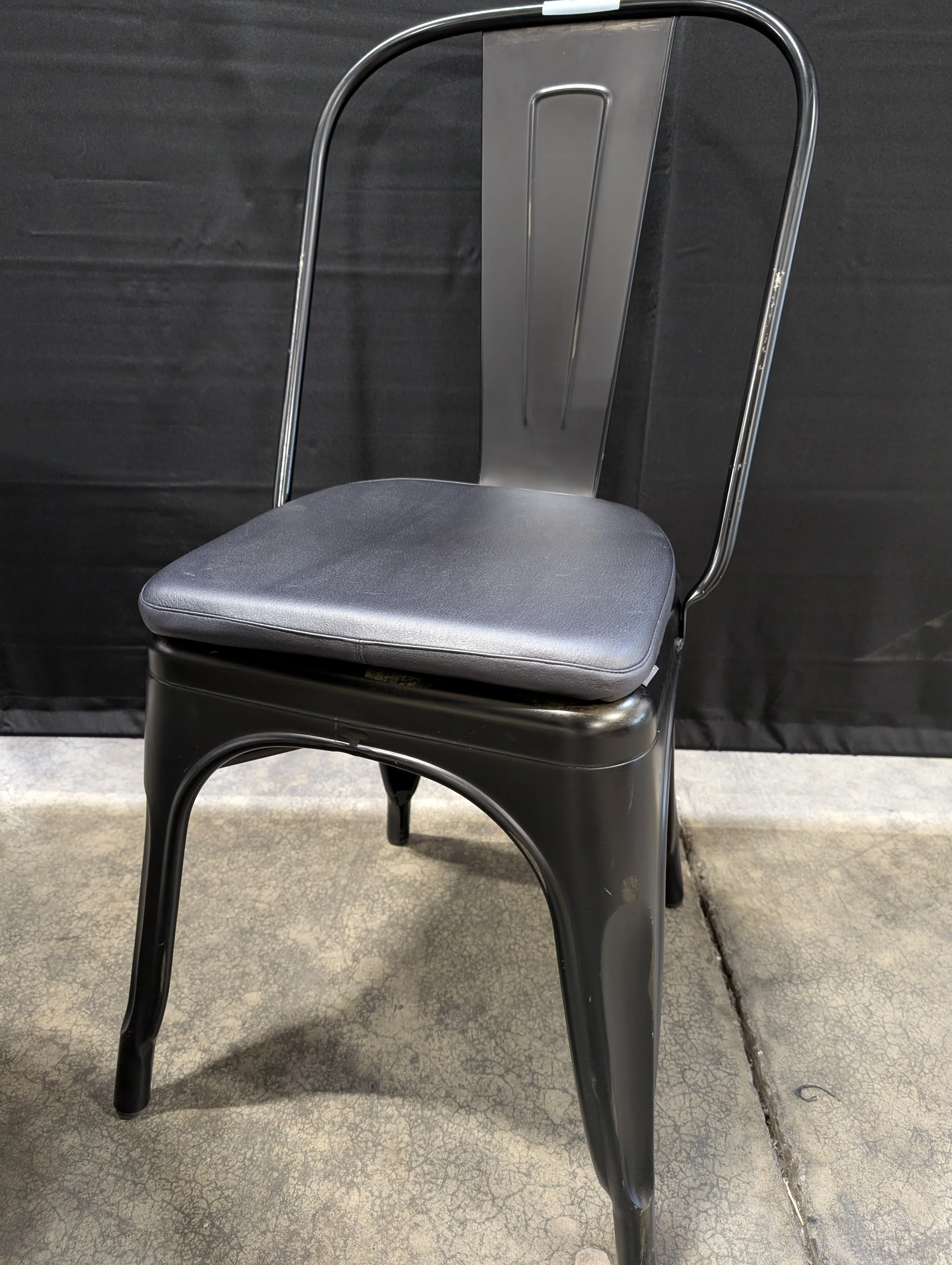 Industrial Style Round Dining Table with Four Black Metal Chairs - Image 4