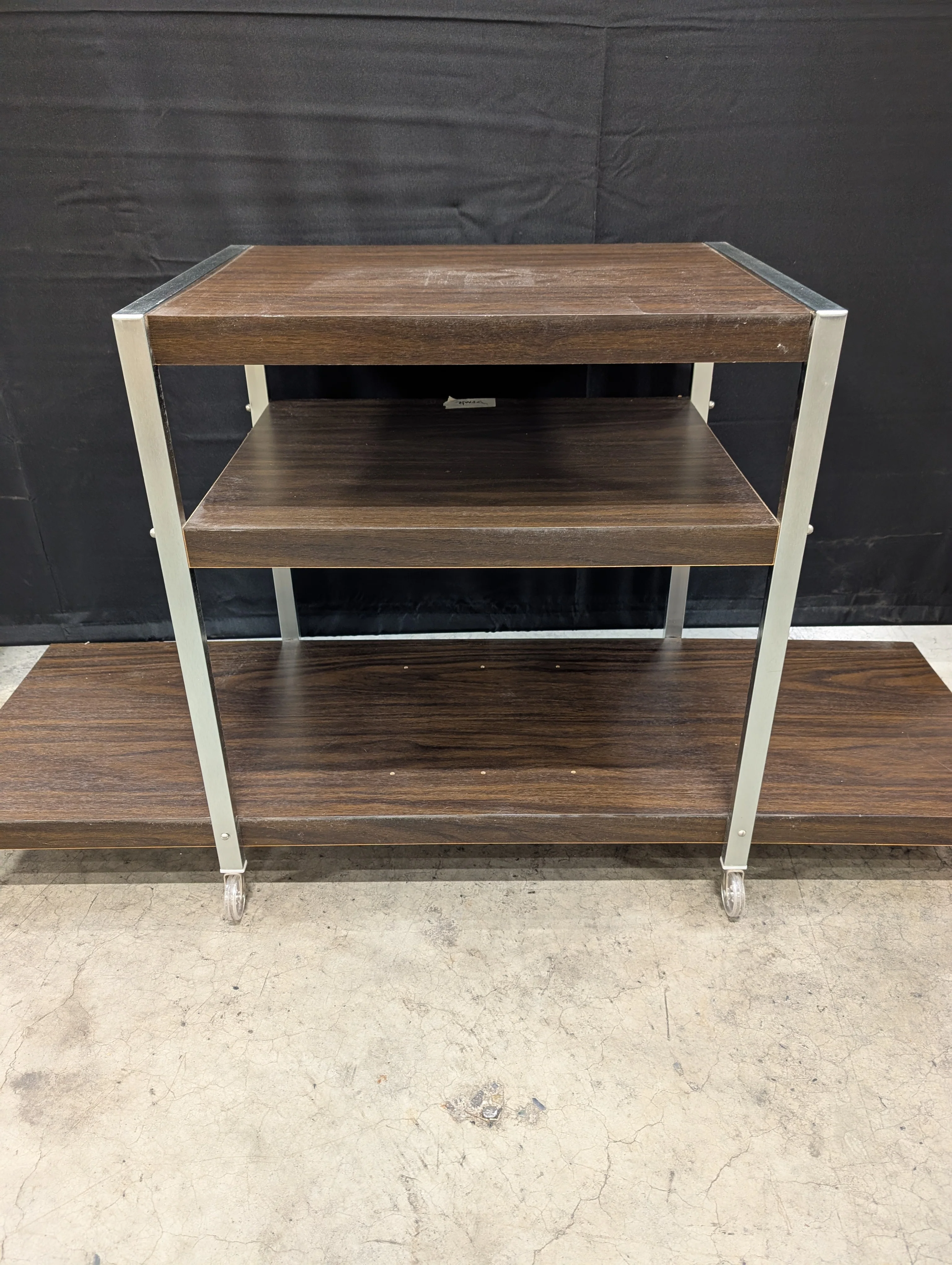 Vintage Three-Tiered Rolling Storage Cart with Dark Wood Finish - Image 3