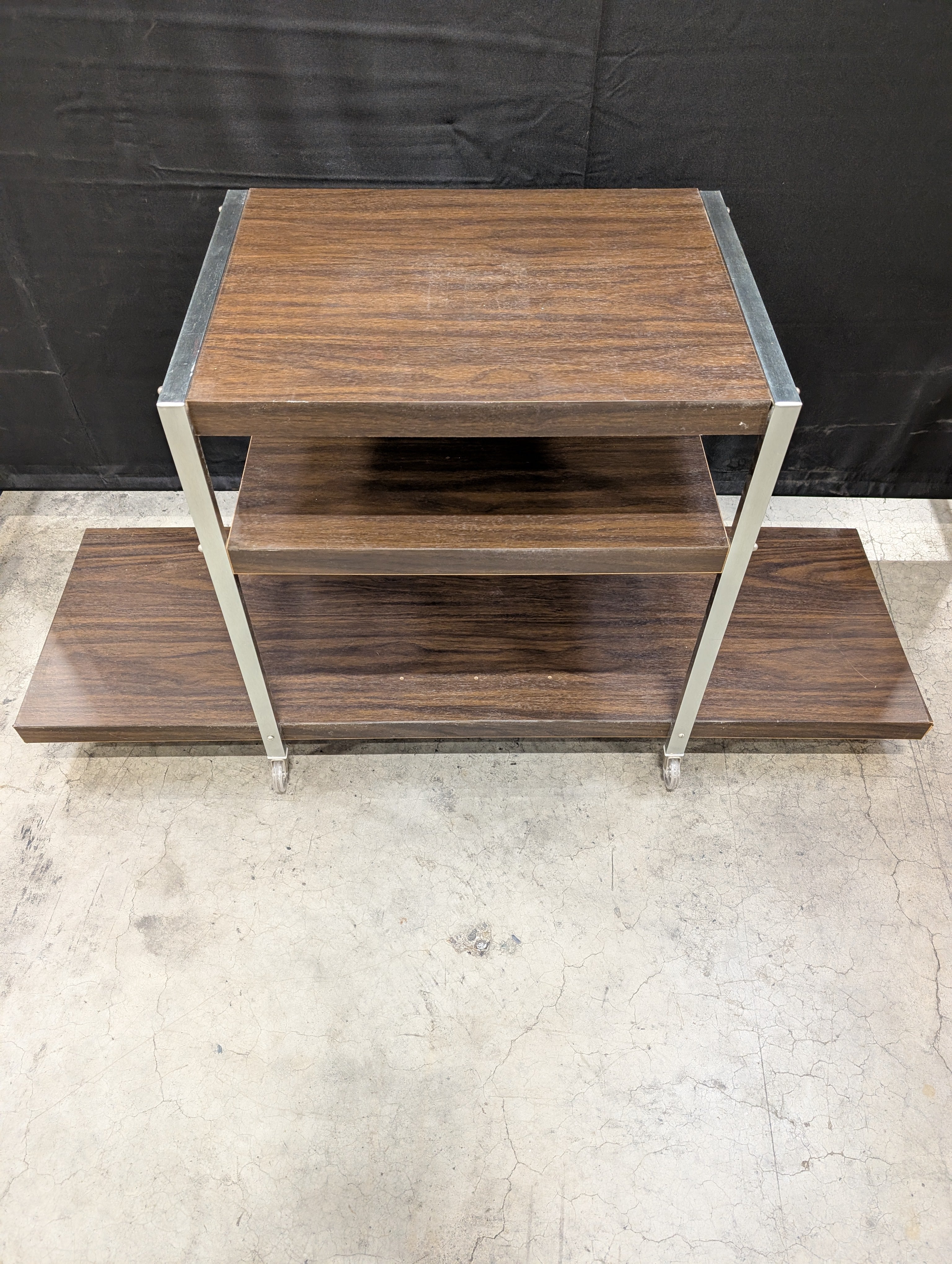 Vintage Three-Tiered Rolling Storage Cart with Dark Wood Finish - Image 5