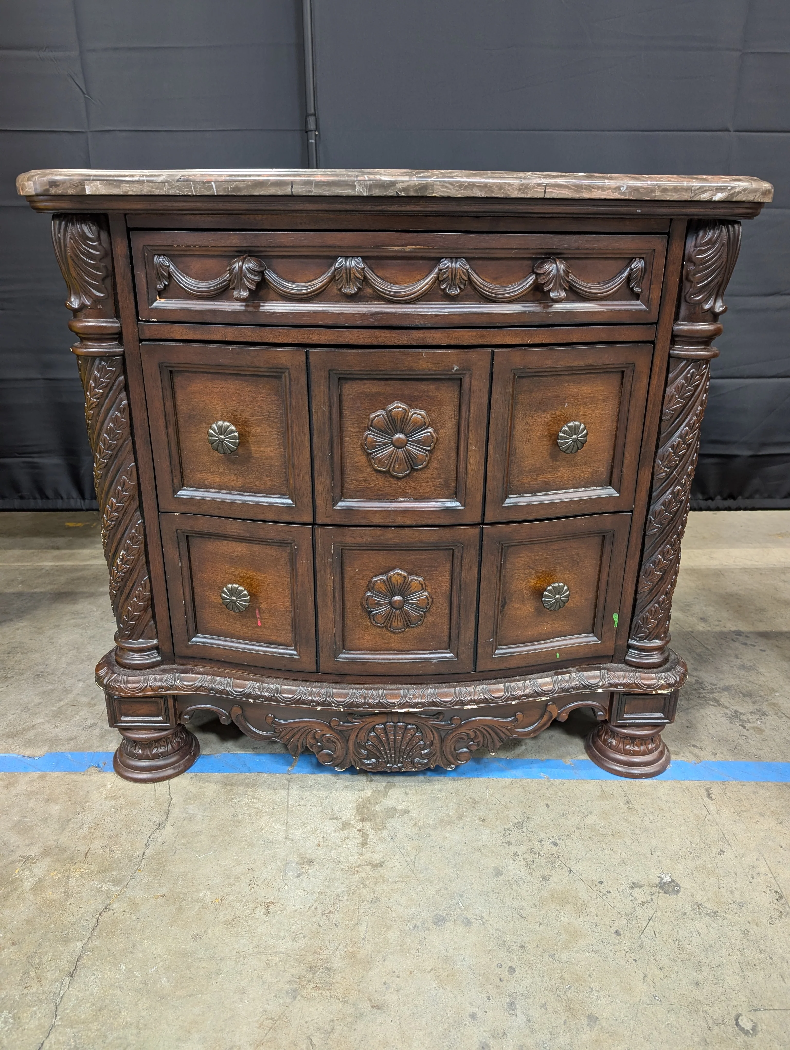 Carved Dark Wood Nightstand with Marble Top
