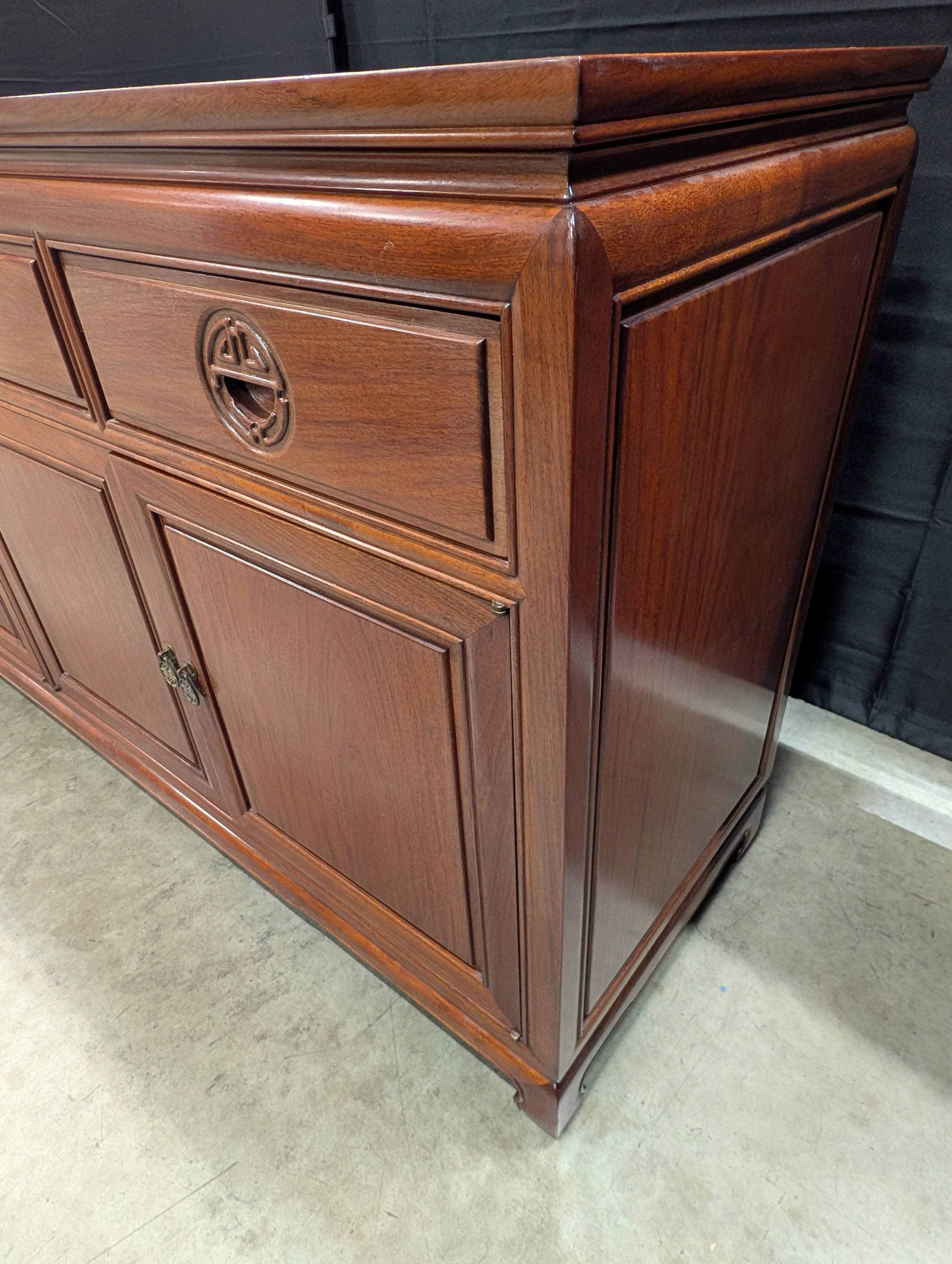 Rich Toned Wooden Sideboard with Carved Accents - Image 11