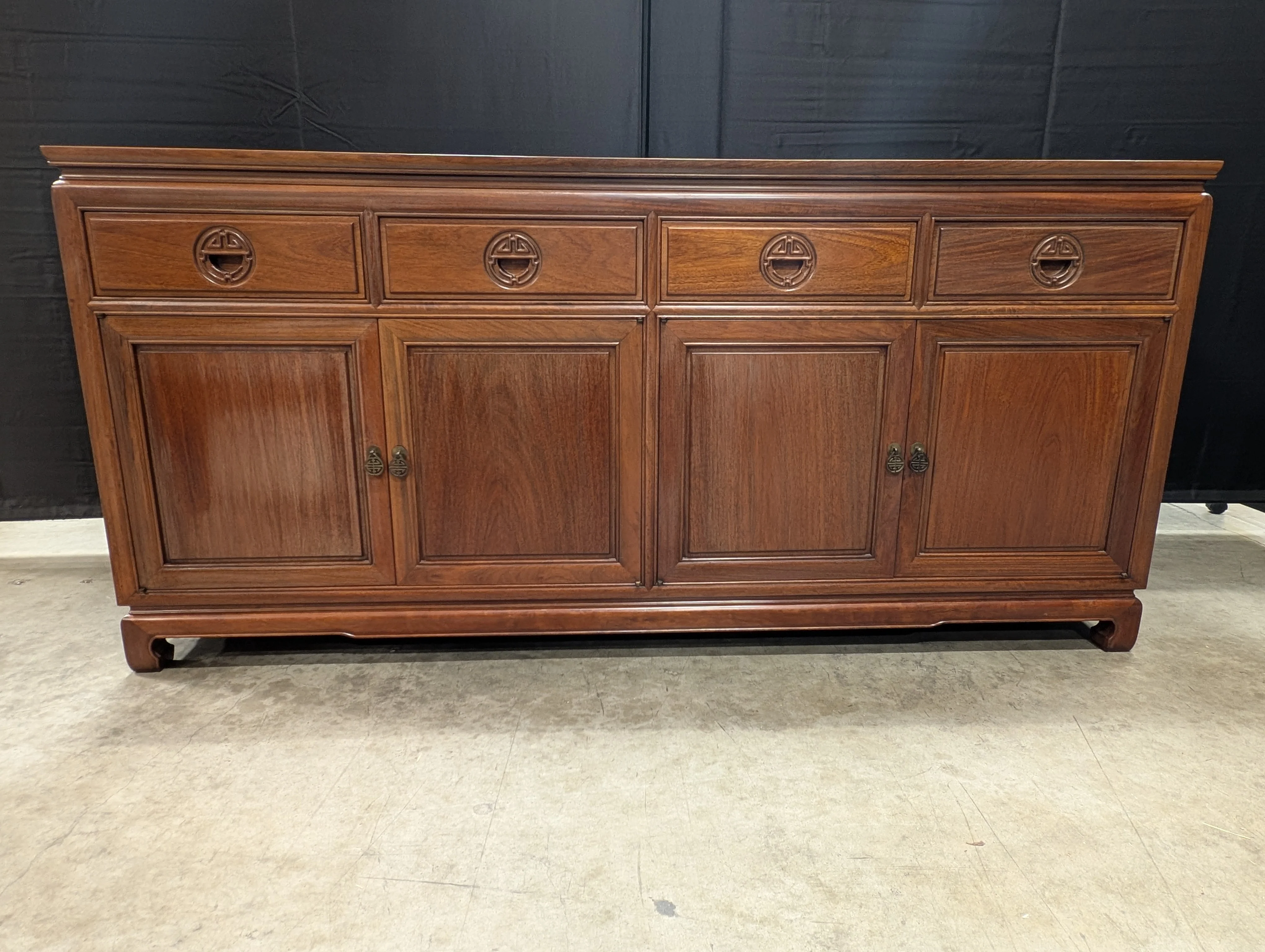 Rich Toned Wooden Sideboard with Carved Accents - Image 2