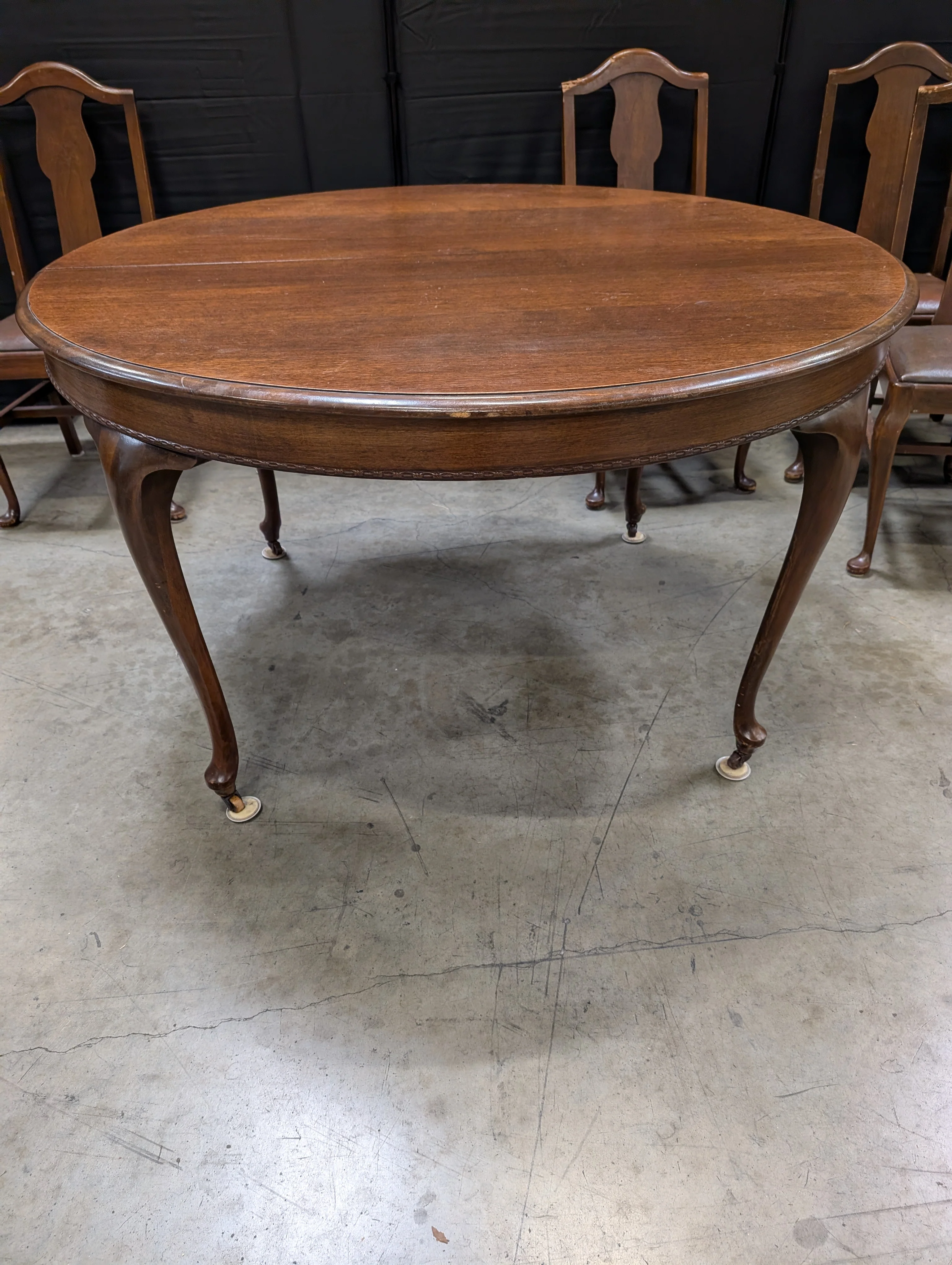 Antique Dark Wood Round Dining Table with six Dining Chairs