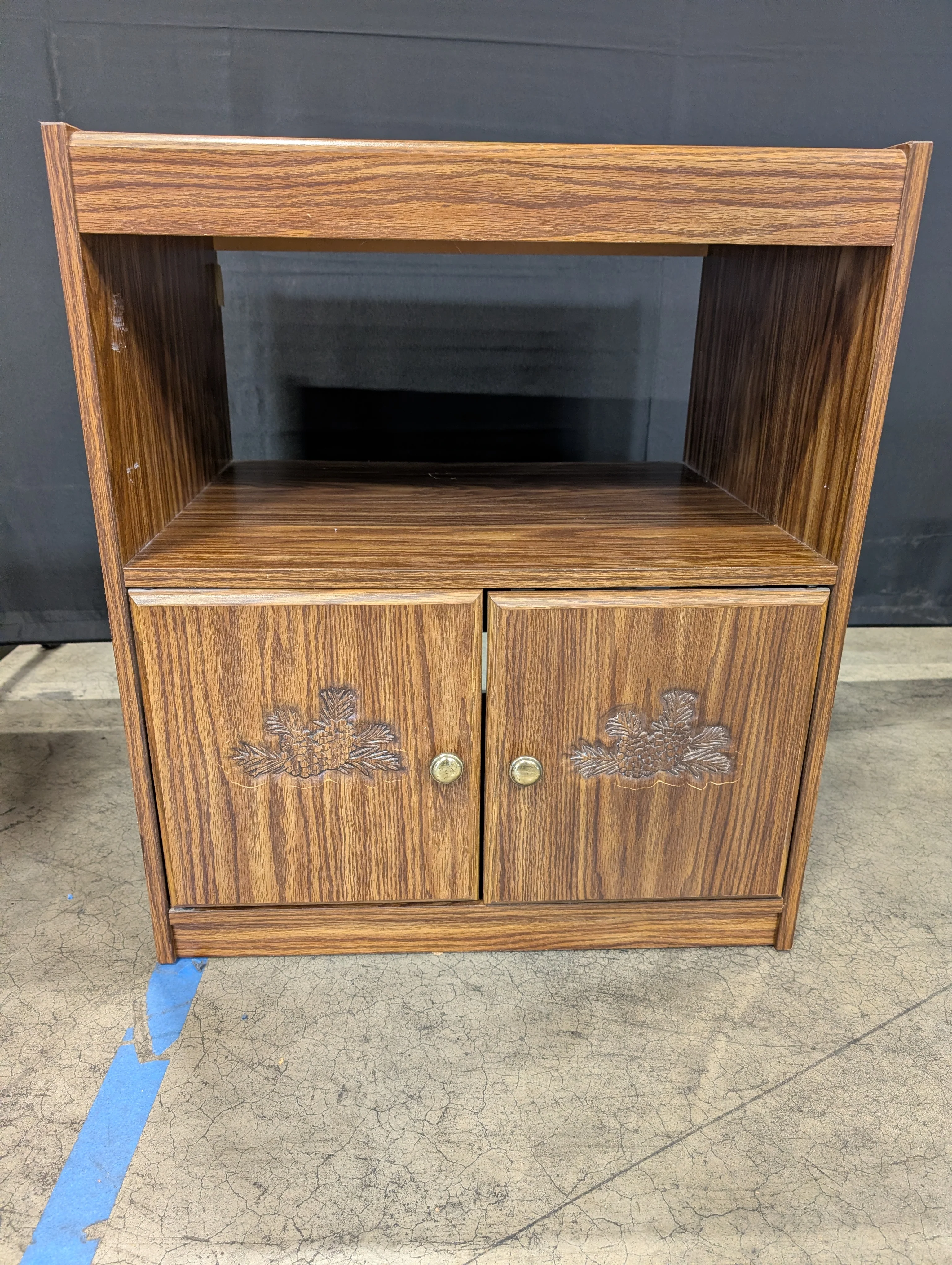 Rolling Brown Wood-Look Accent Cabinet with Carved Doors - Image 2