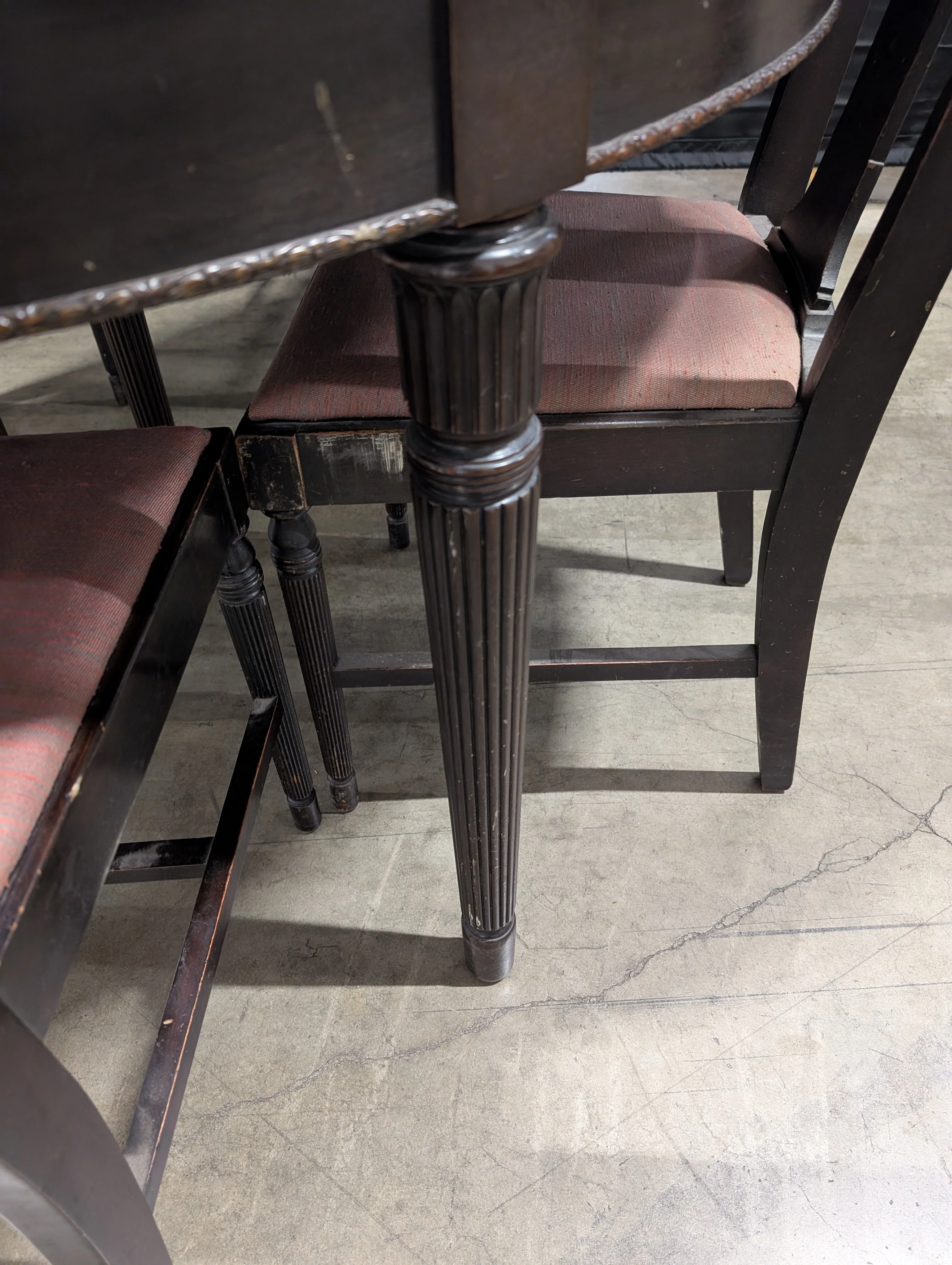 Dark Wood Oval Extendable Dining Table with Seven matching Chairs - Image 3
