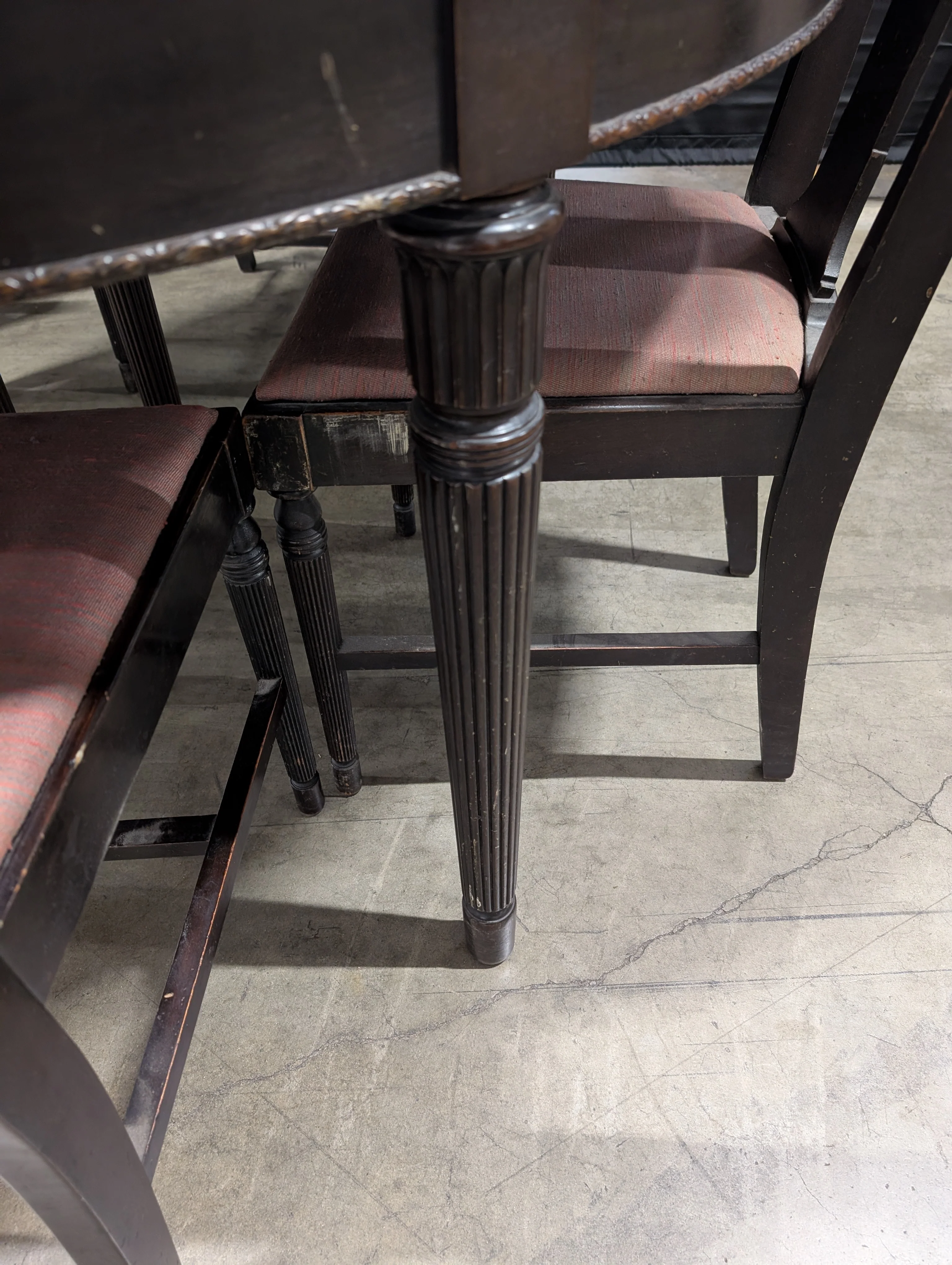 Dark Wood Oval Extendable Dining Table with Seven matching Chairs - Image 4