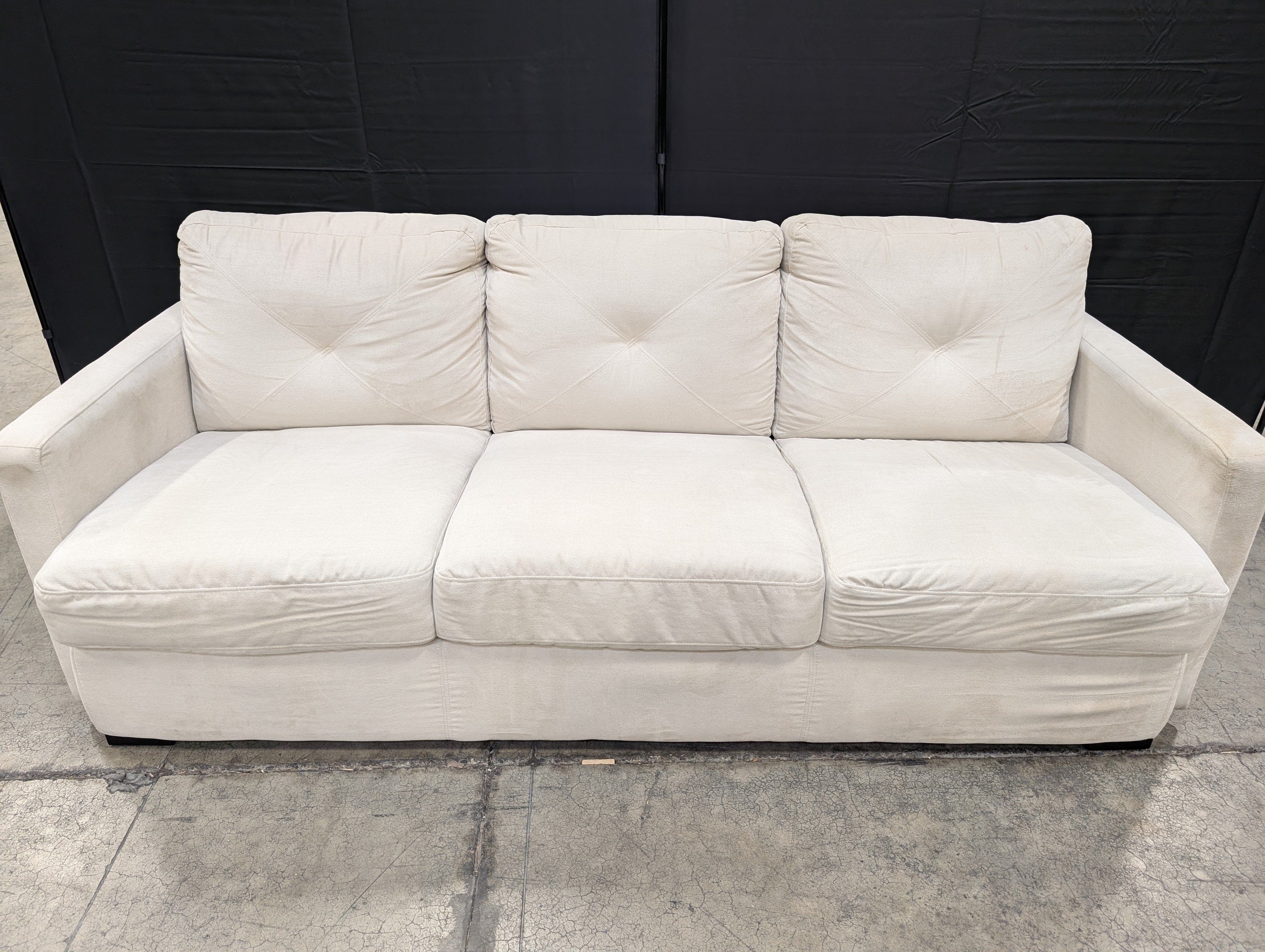 Spacious Light Beige Fabric Three-Seater Sofa