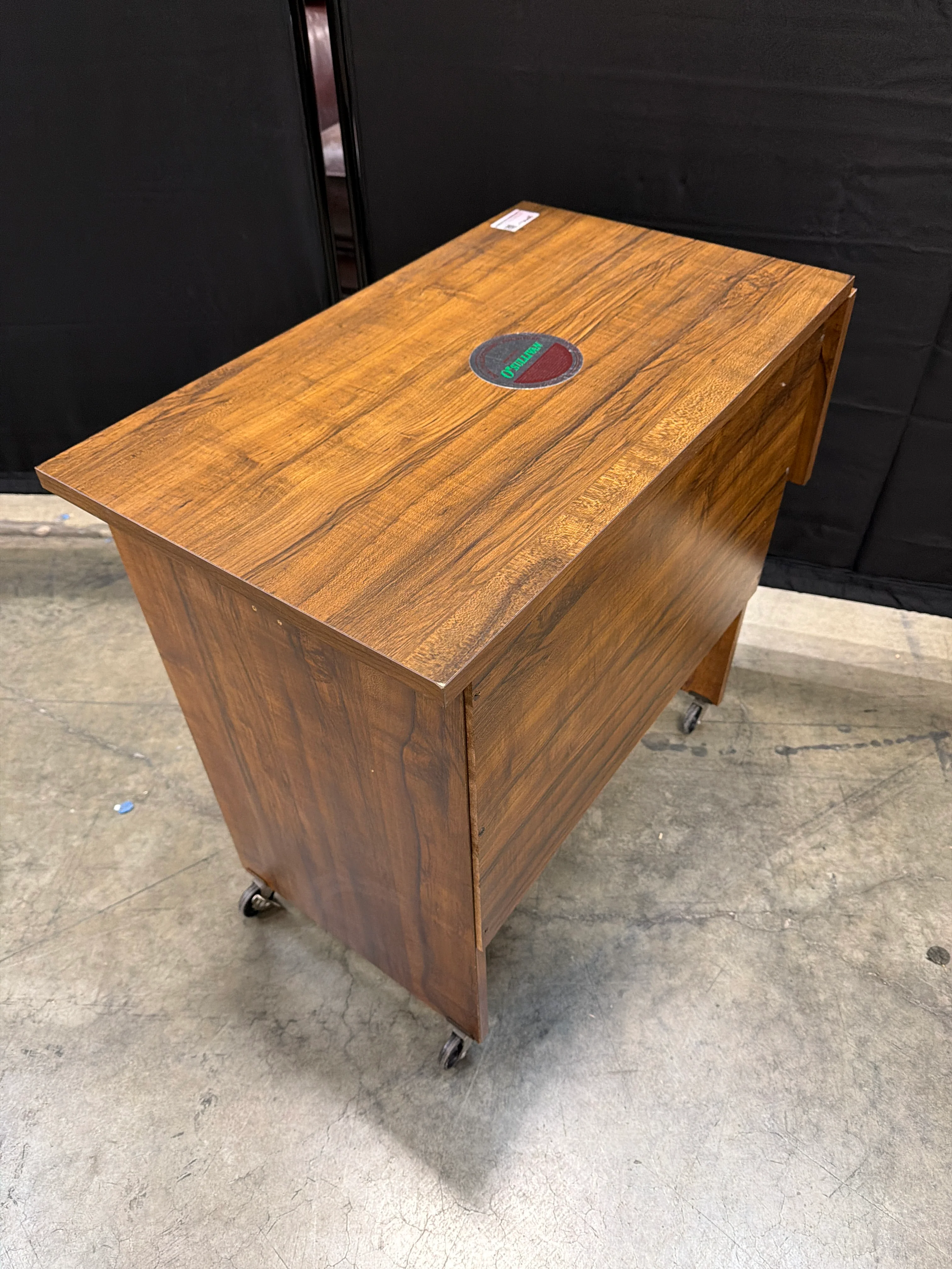 O’Sullivan Rectangular Wood Utility Table with Folding Leaf and Rolling Casters - Image 4