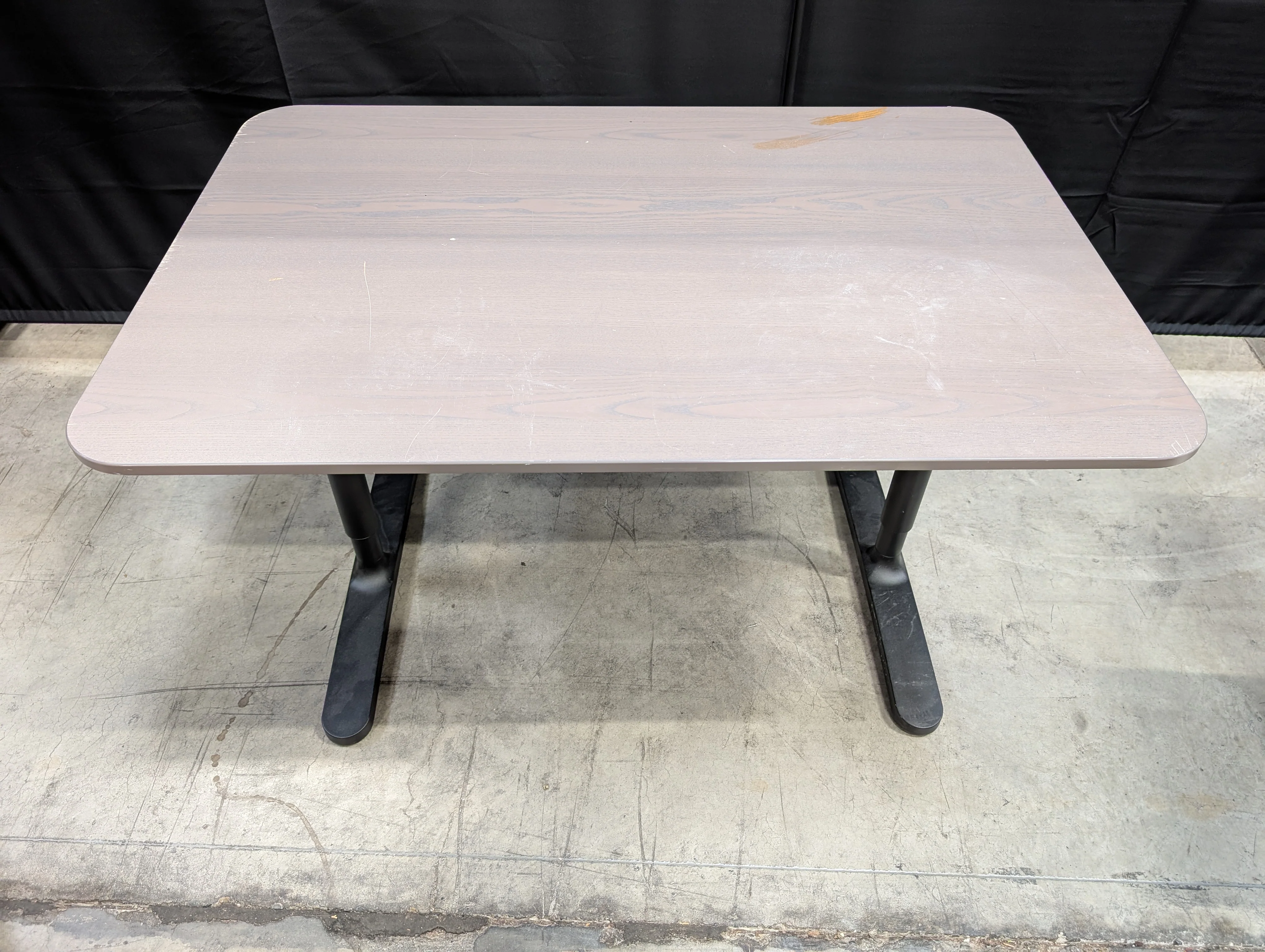 Modern Greyish-Brown Rectangular Table with Black Metal Bases - Image 3