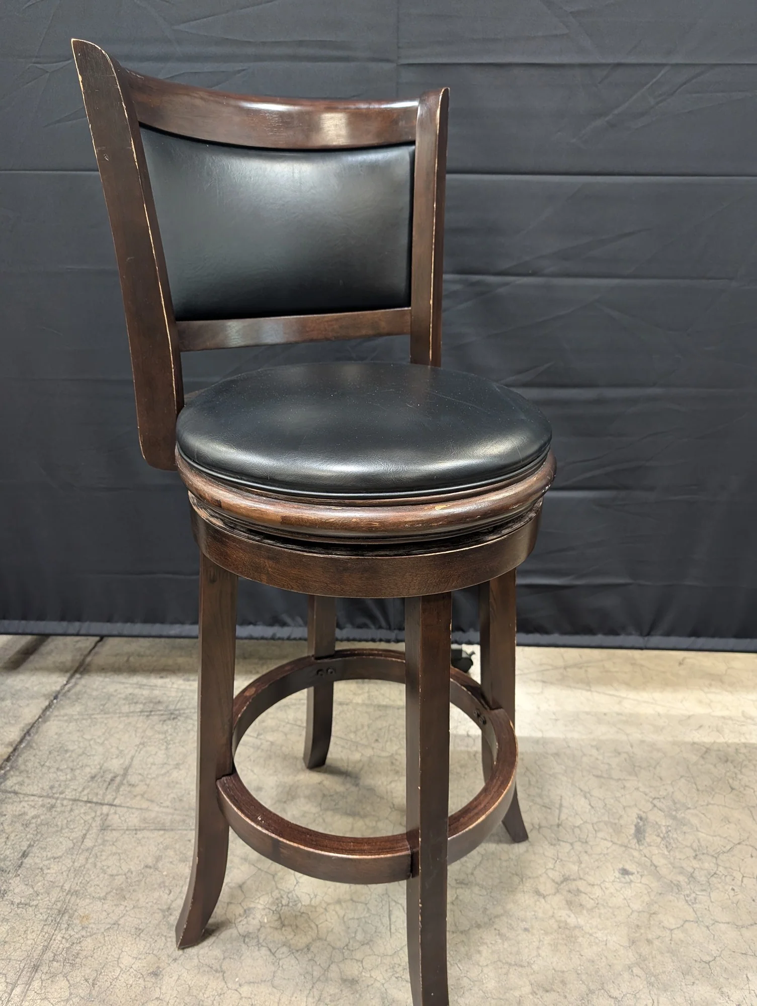 TIMBERCO Dark Wood Swivel Bar Stool with Black Upholstery