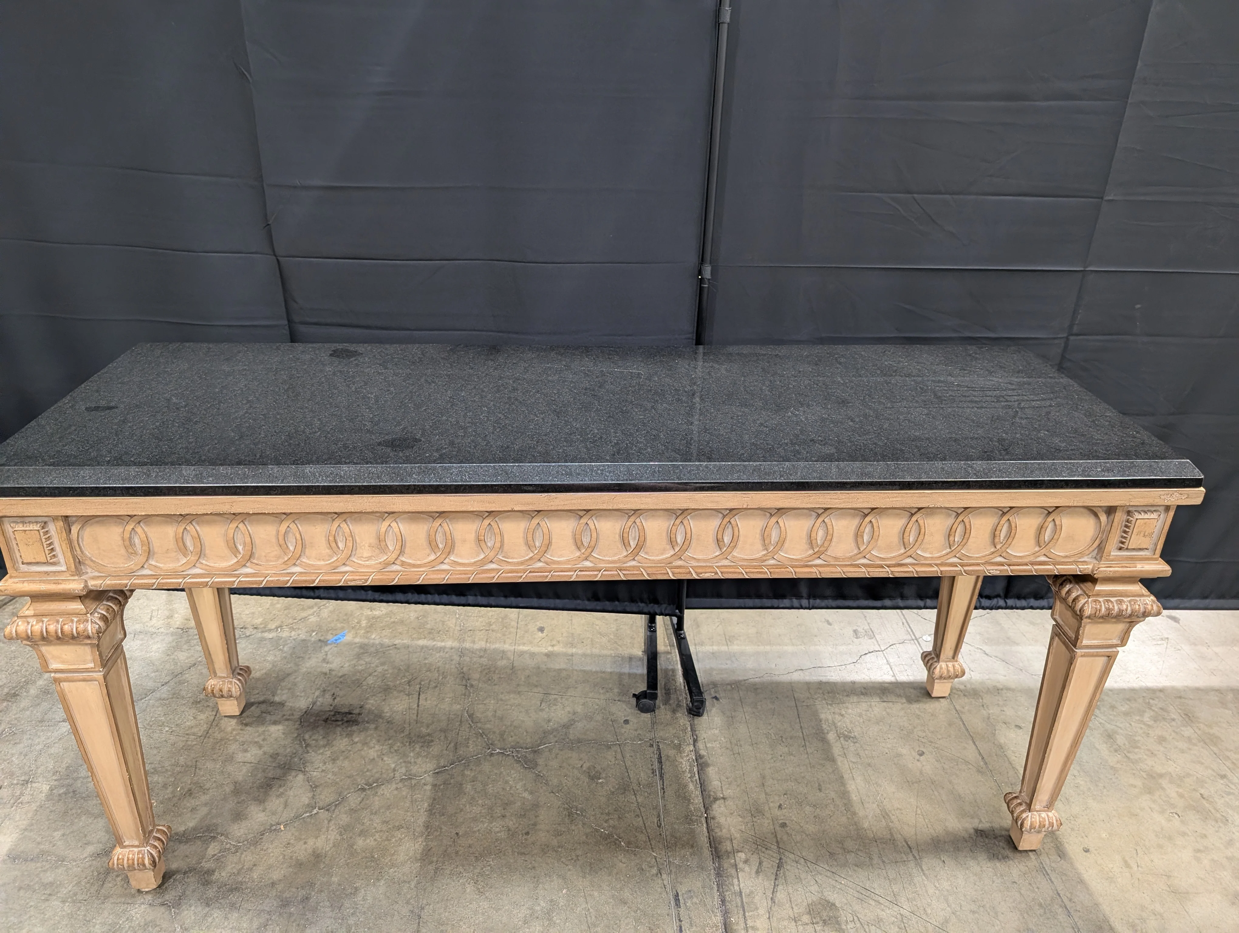 Ornate Carved Wood Console Table with Dark Stone Top