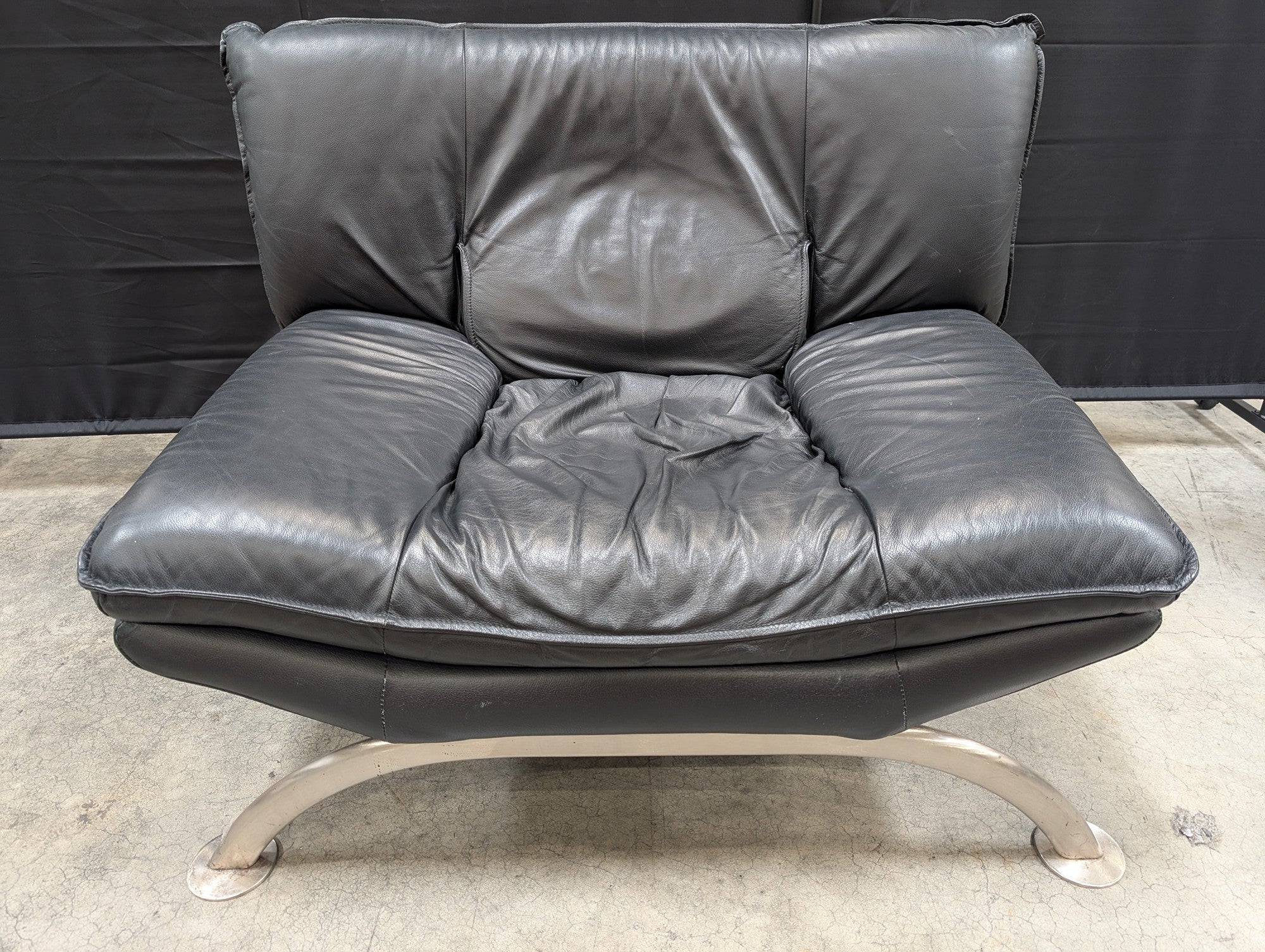 Contemporary Black Leather Lounge Chair with Arched Metal Base - Image 2