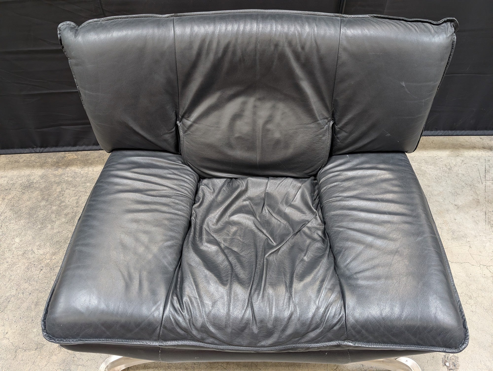 Contemporary Black Leather Lounge Chair with Arched Metal Base - Image 3