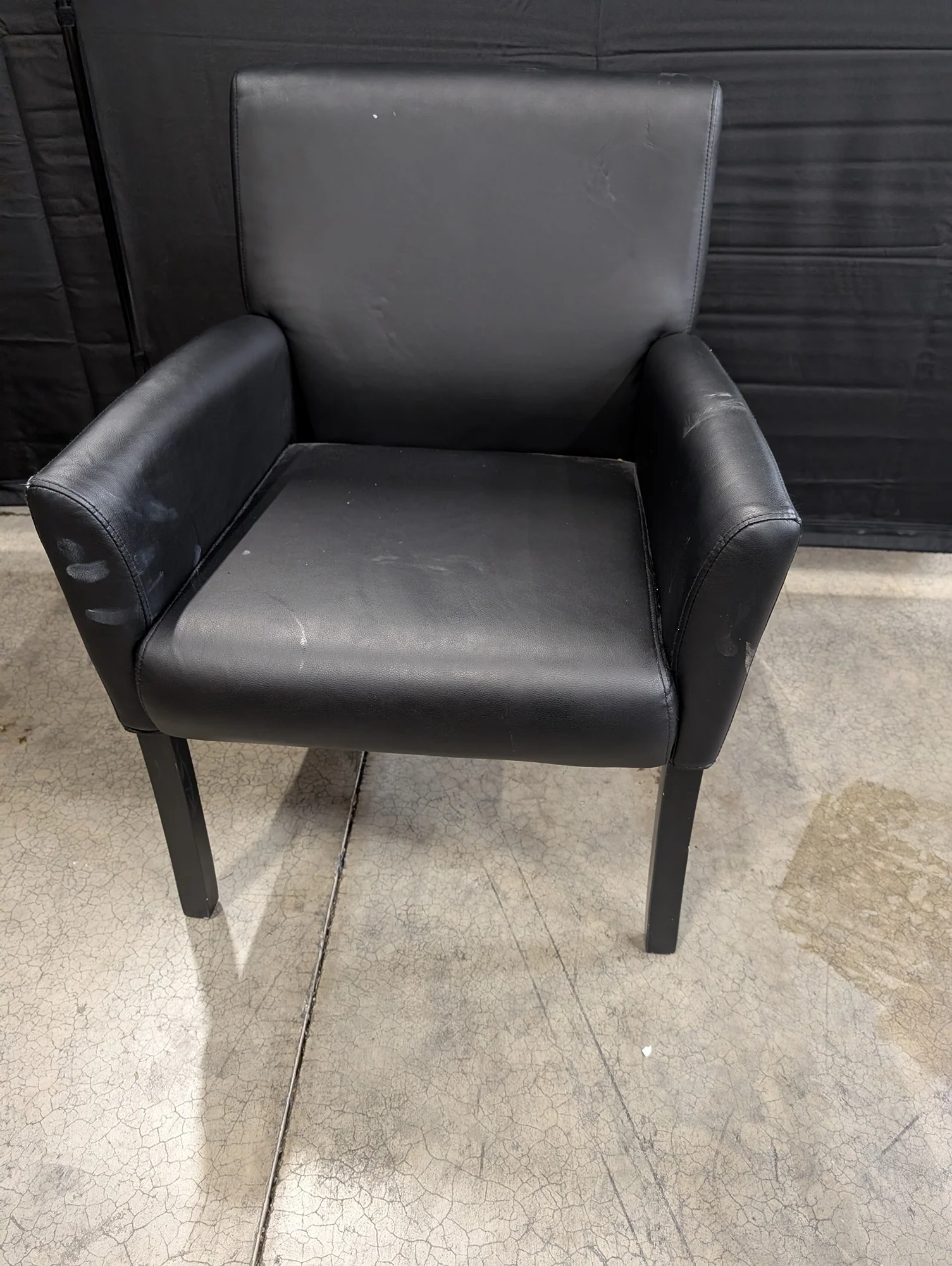 Modern Black Upholstered Armchair with Dark Legs - Image 2