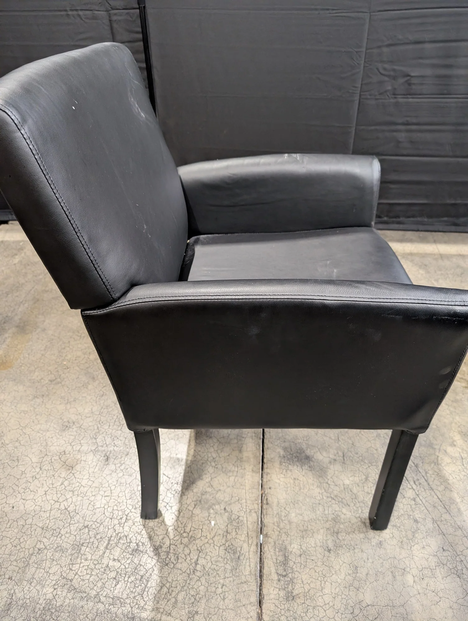 Modern Black Upholstered Armchair with Dark Legs - Image 4