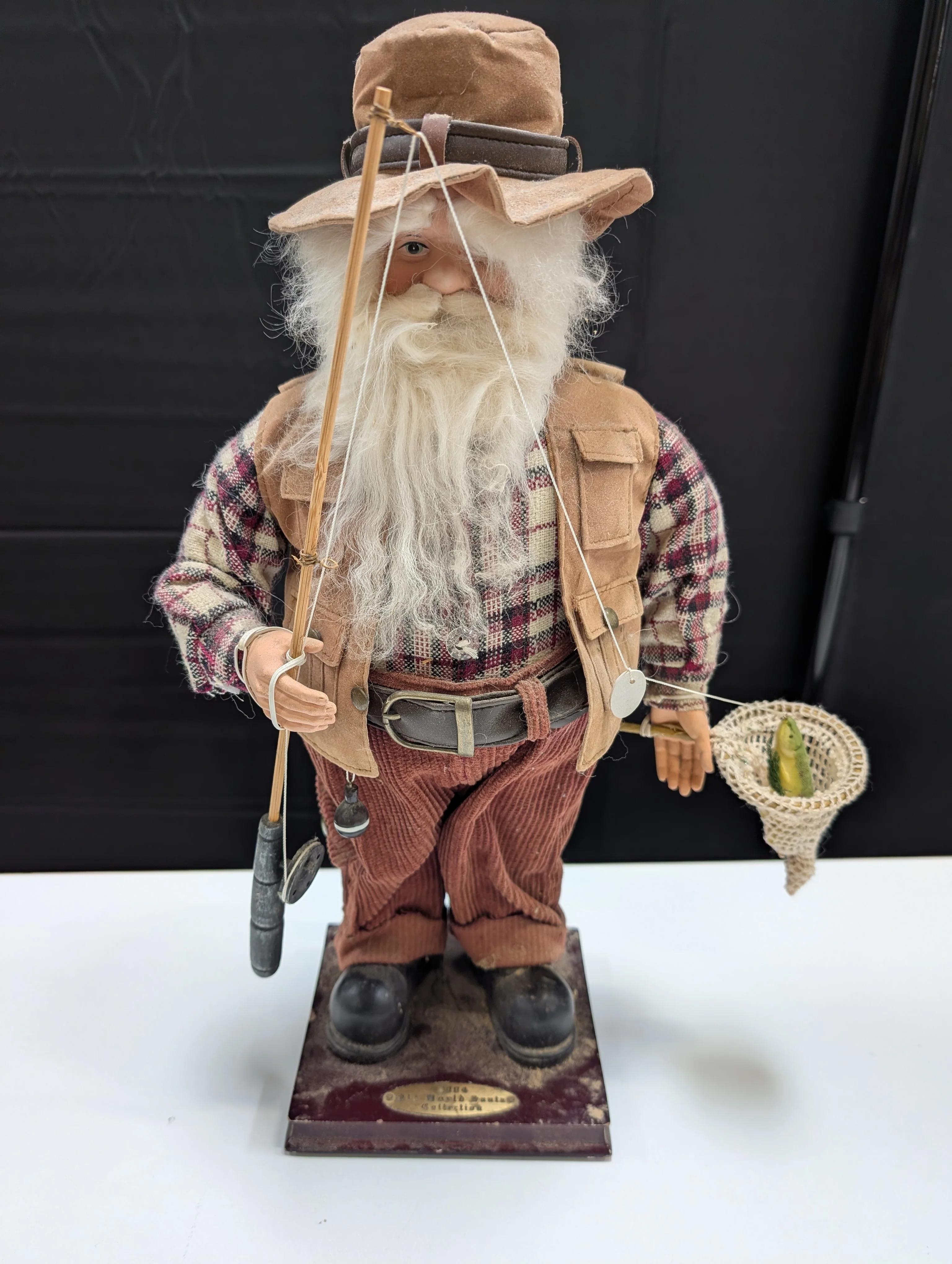 Rustic Fisherman Figurine with Fishing Rod and Hat