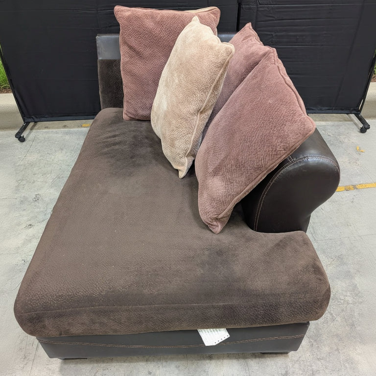 Half of Brown Chaise Lounge with four  Plush Cushions