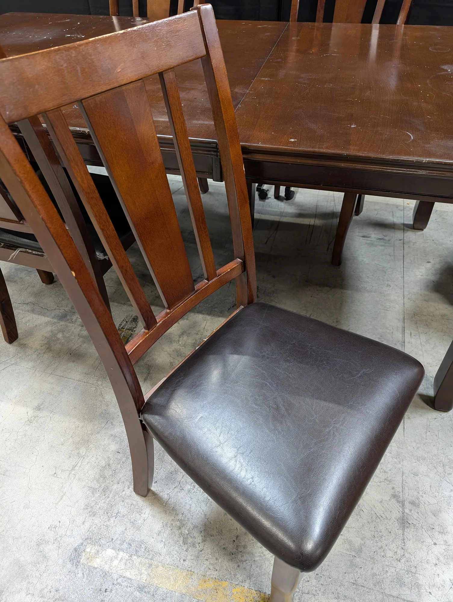 Used Dark Brown Wood Dining Table with Six Slat Back Chairs - Image 5