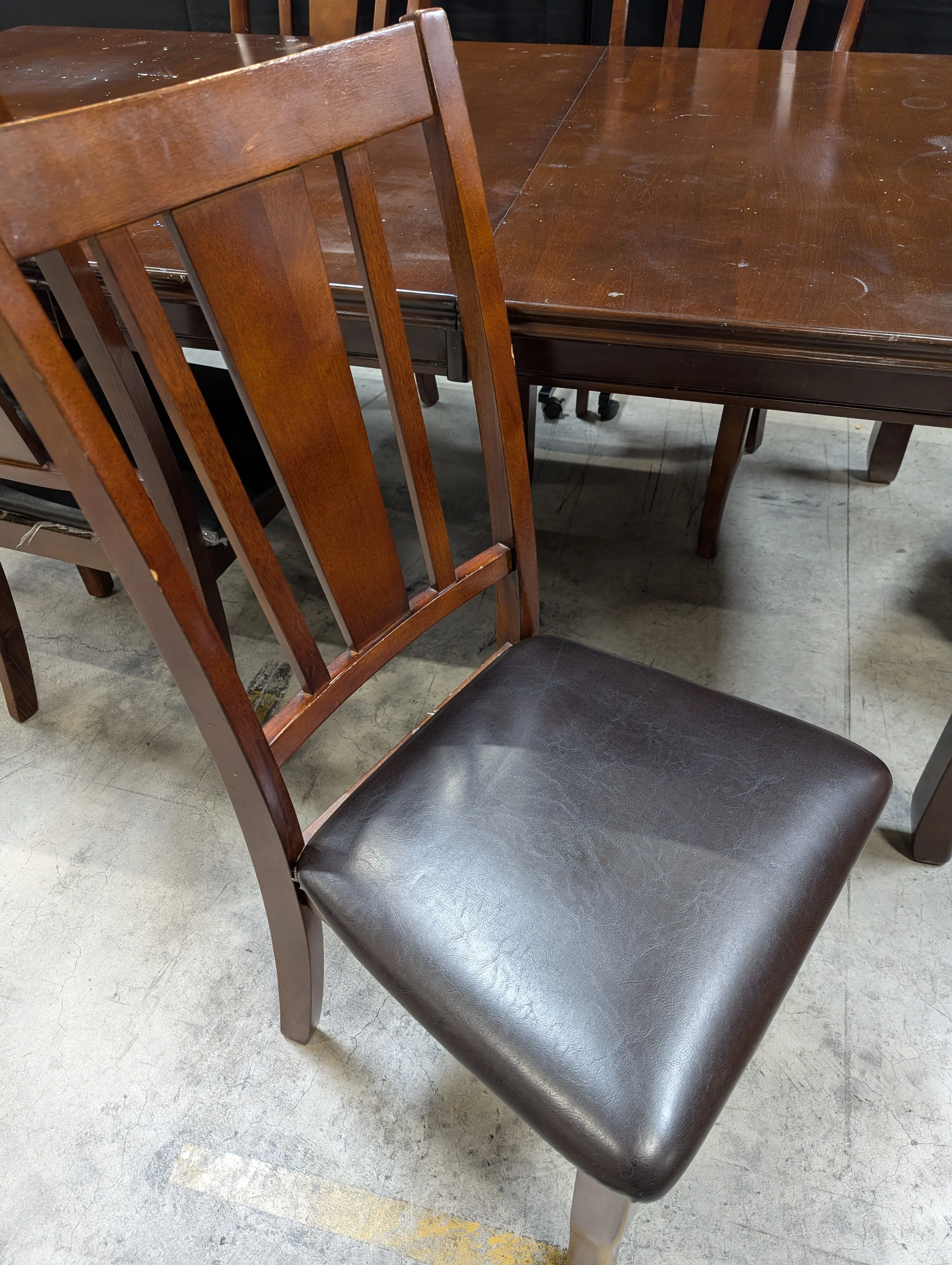 Used Dark Brown Wood Dining Table with Six Slat Back Chairs - Image 7