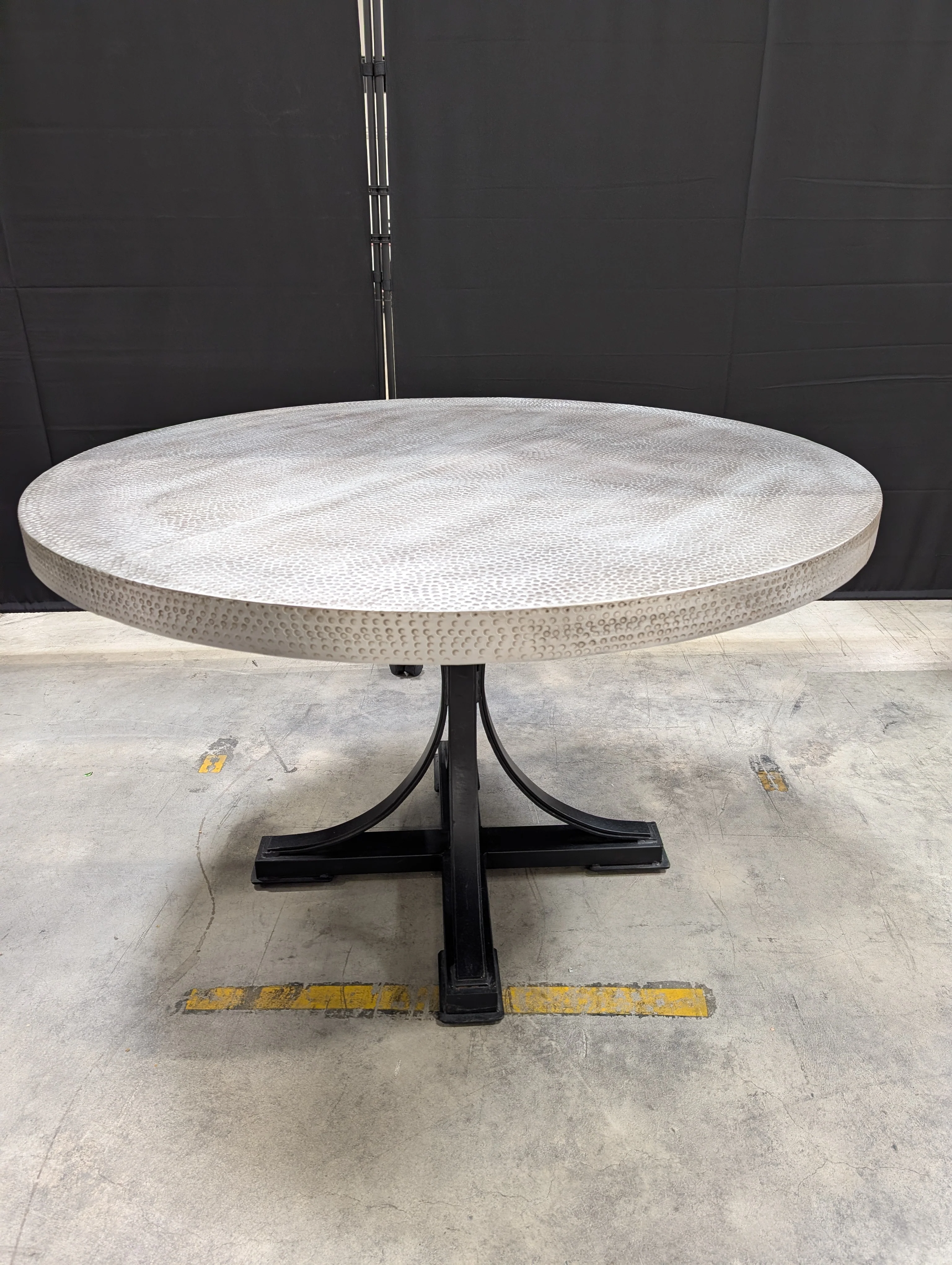 Distinctive Grey Textured Round Tabletop with Black Metal Base