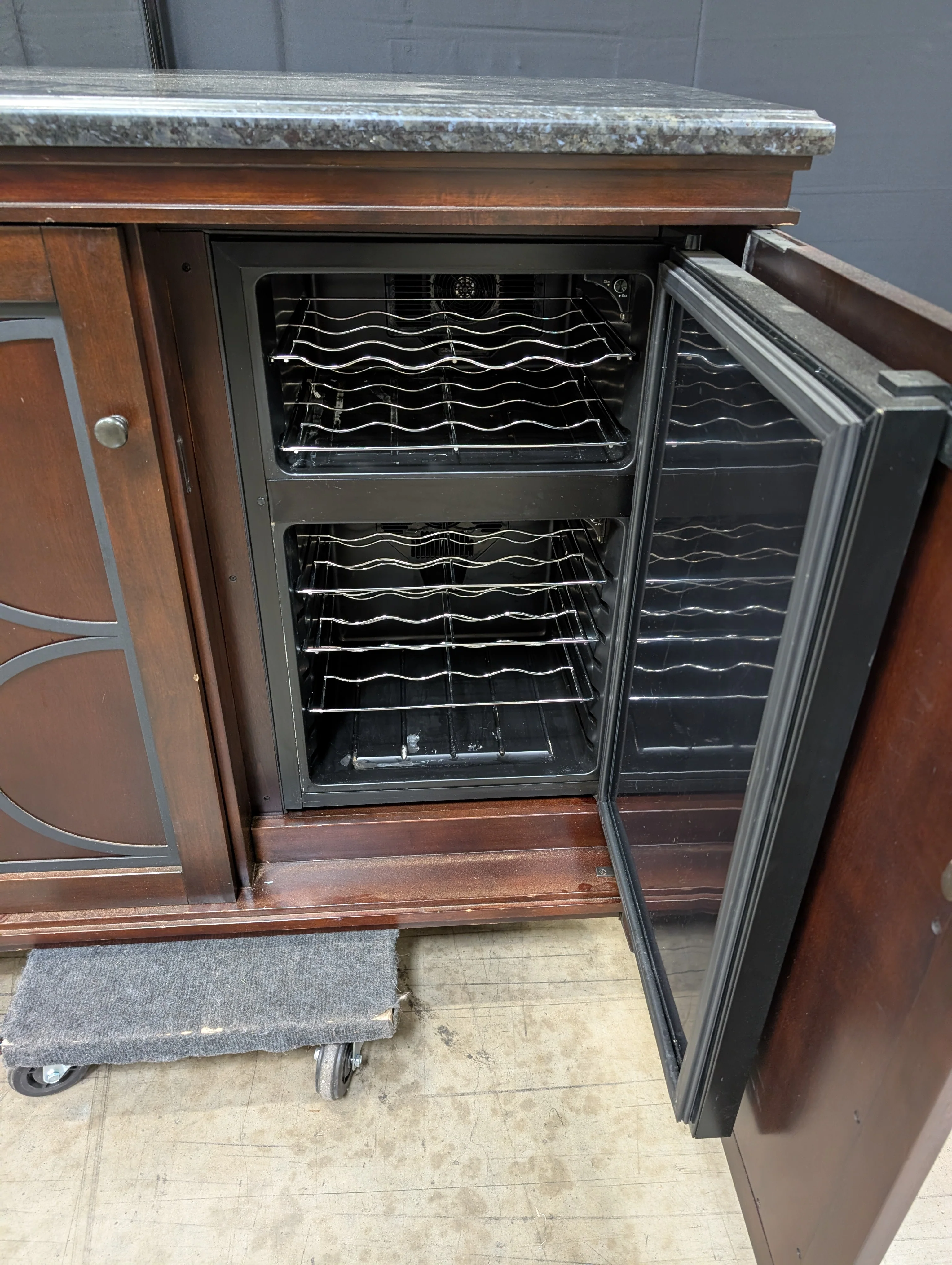 Dark Wood Storage Cabinet with Granite Top and Decorative Doors - Image 2
