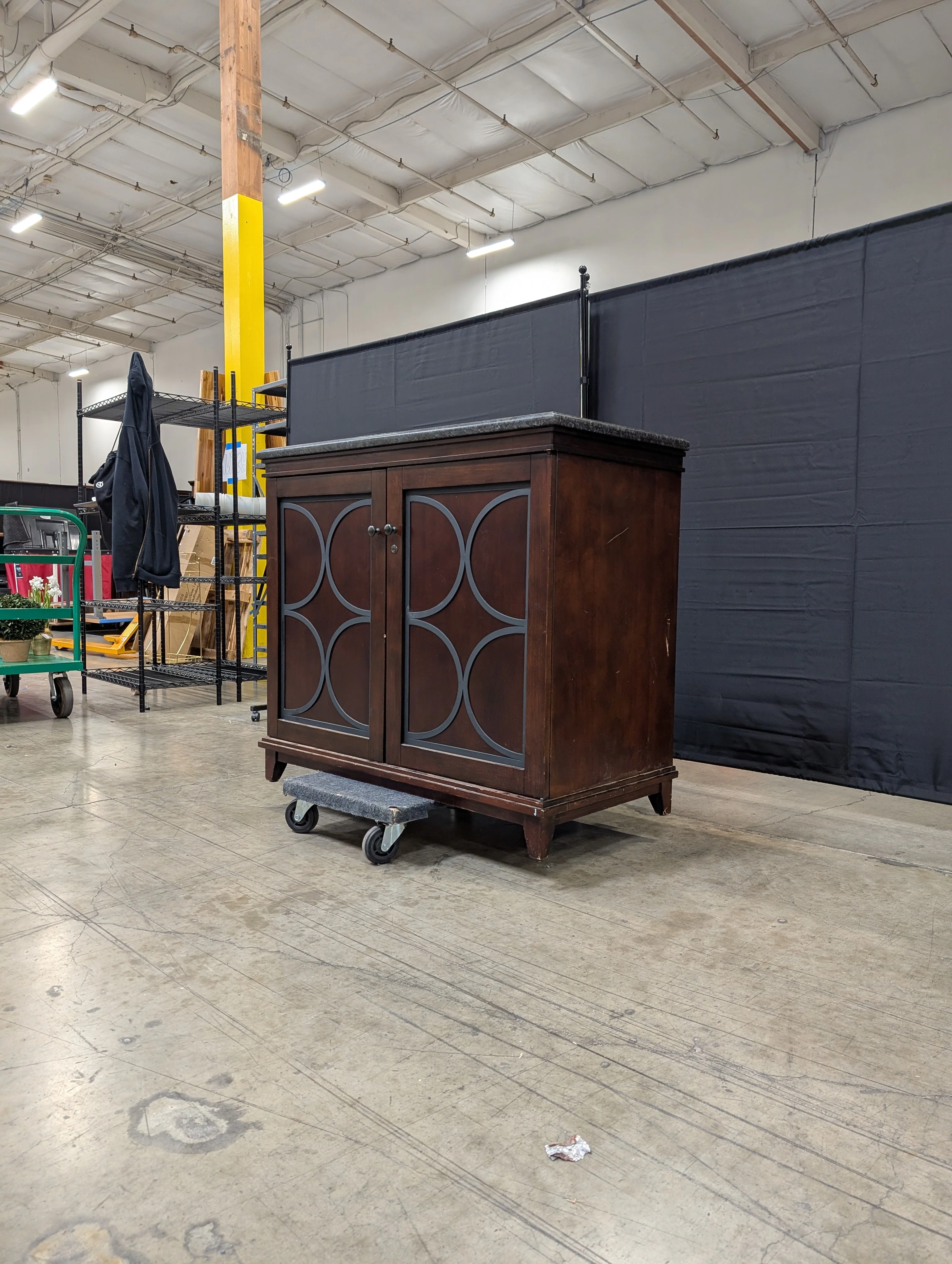 Dark Wood Storage Cabinet with Granite Top and Decorative Doors - Image 7