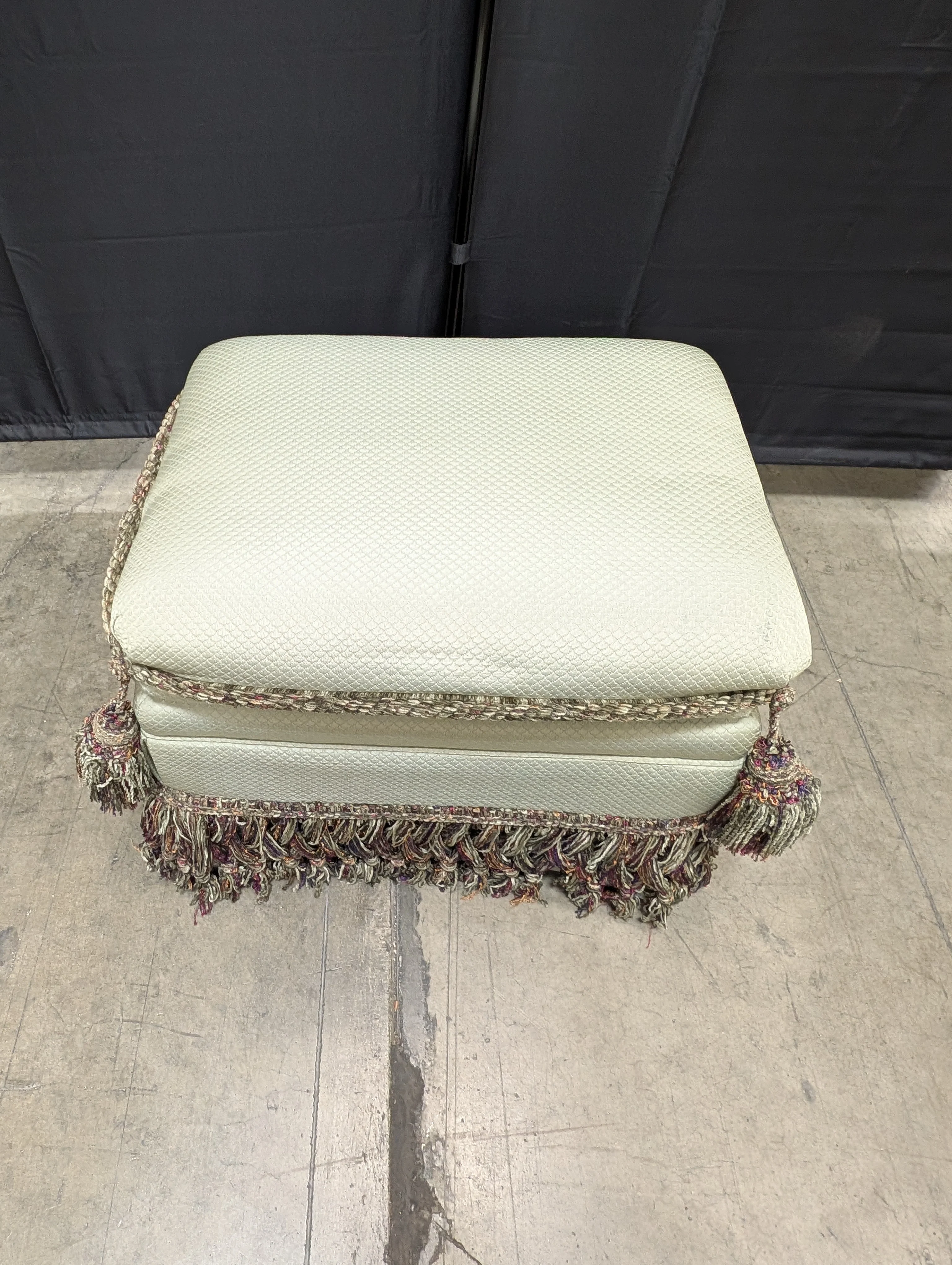 Textured Upholstered Cushion with Tassel Fringe Trim - Image 4