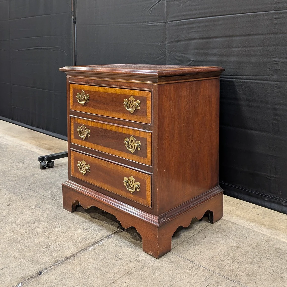 Traditional Dark Wood Three-Drawer Chest with Ornate Brass Pulls - Image 3