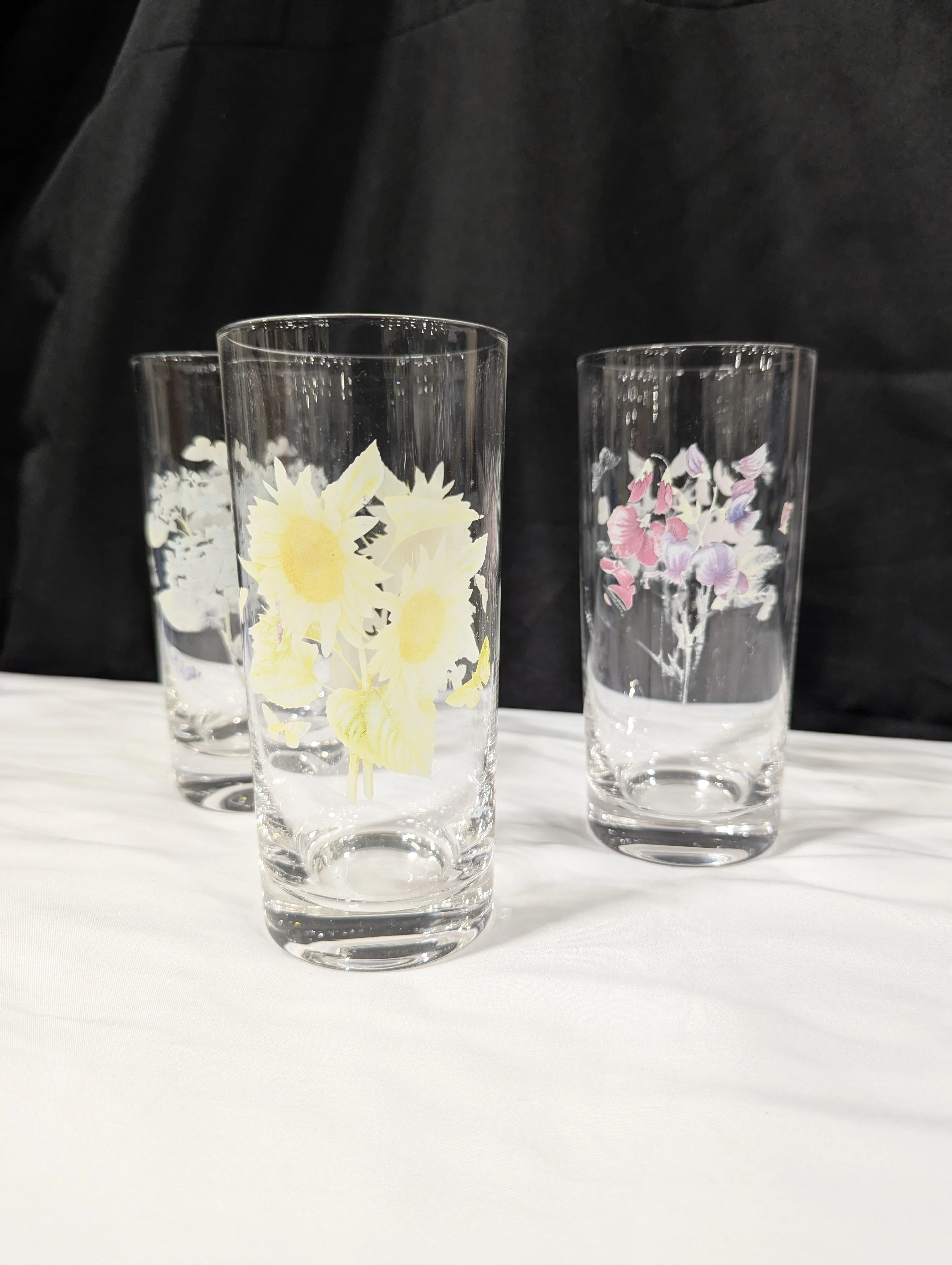 Set of Four Clear Glass Highball Tumblers with Assorted Floral Butterfly Designs - Image 5