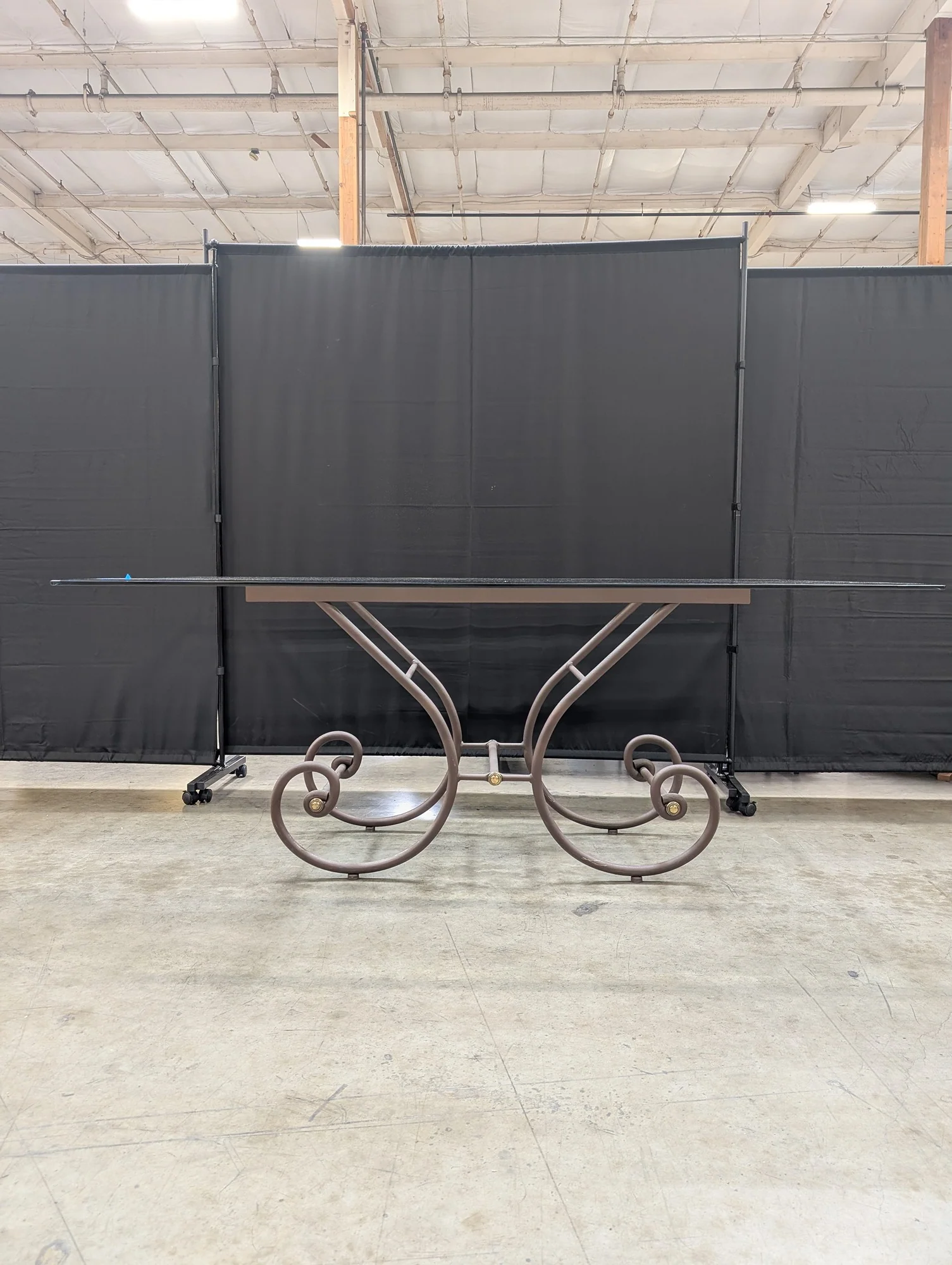 Grand Scrolled Metal Base Glass Top Dining Table